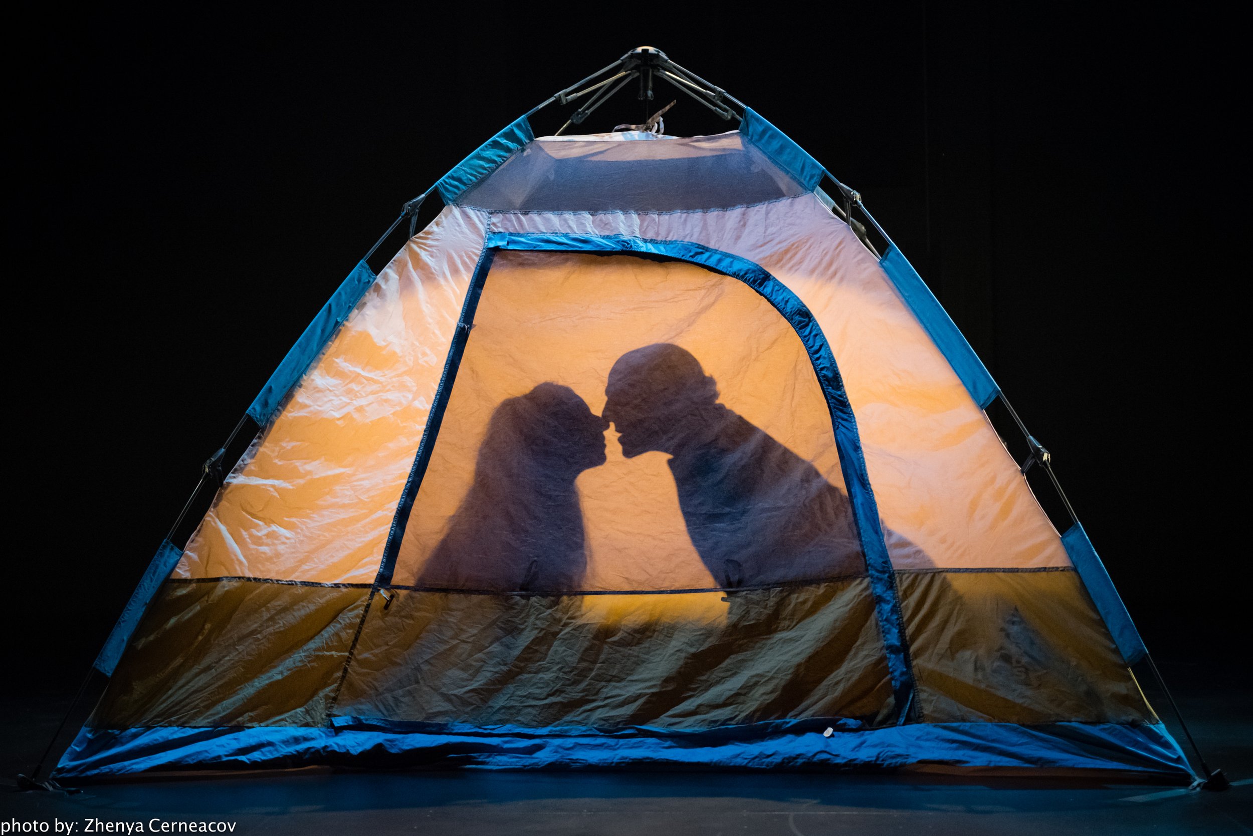 Karen and Allen Kaeja in silhouette inside a tent.