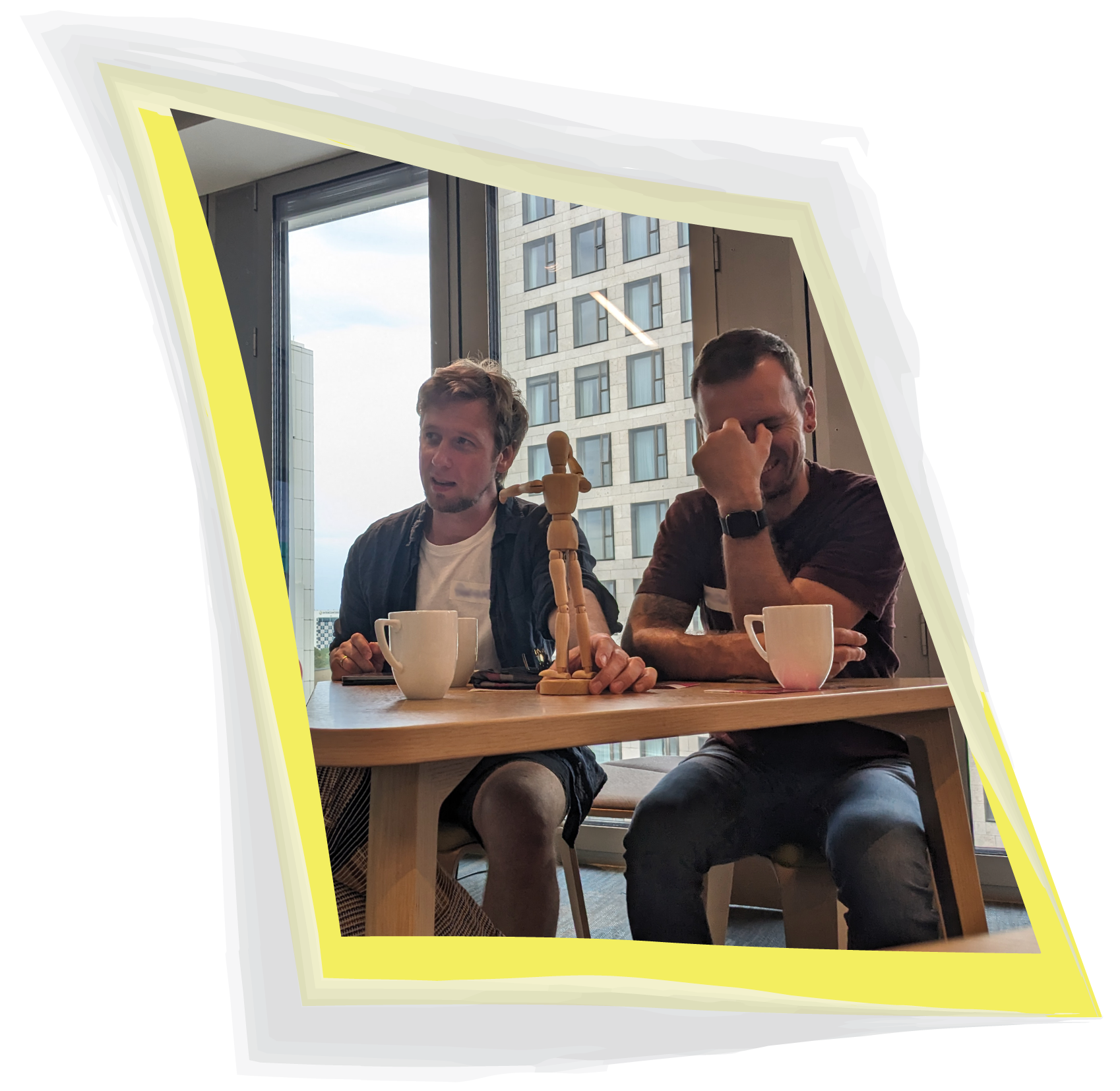 From a Veronica Louis Workshop: Photo of two men, laughing as they try to describe an object in a creative way.