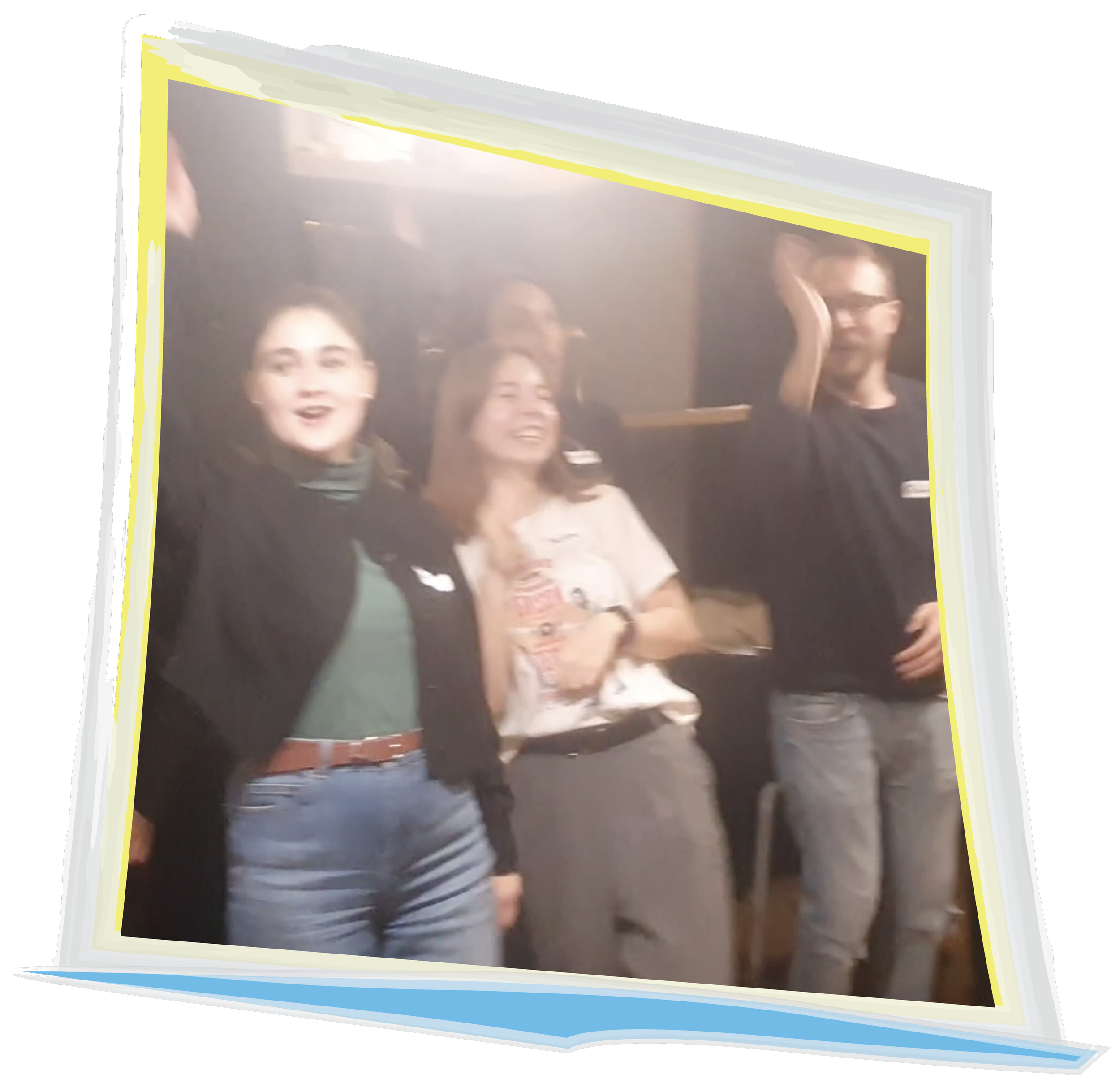 Two women and one man, actively laughing and moving