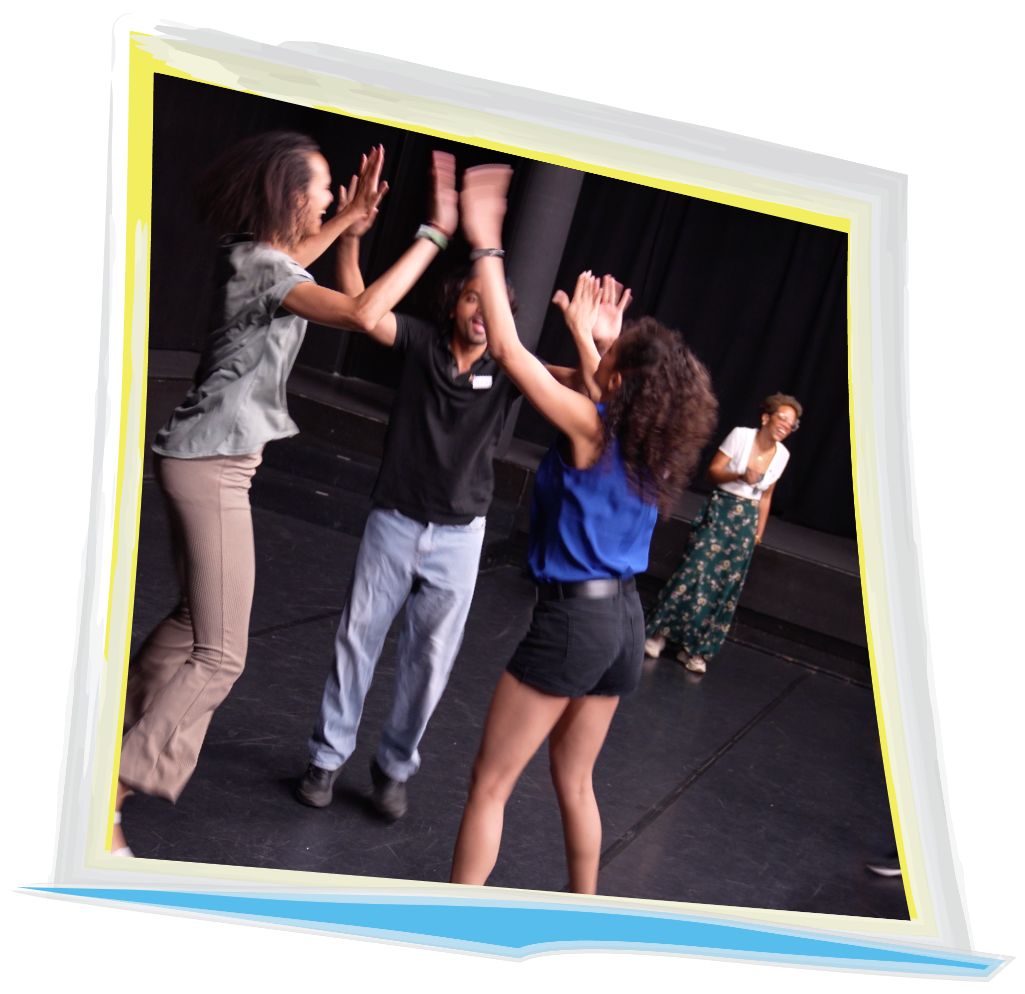 Three participants high-fiving during a group game