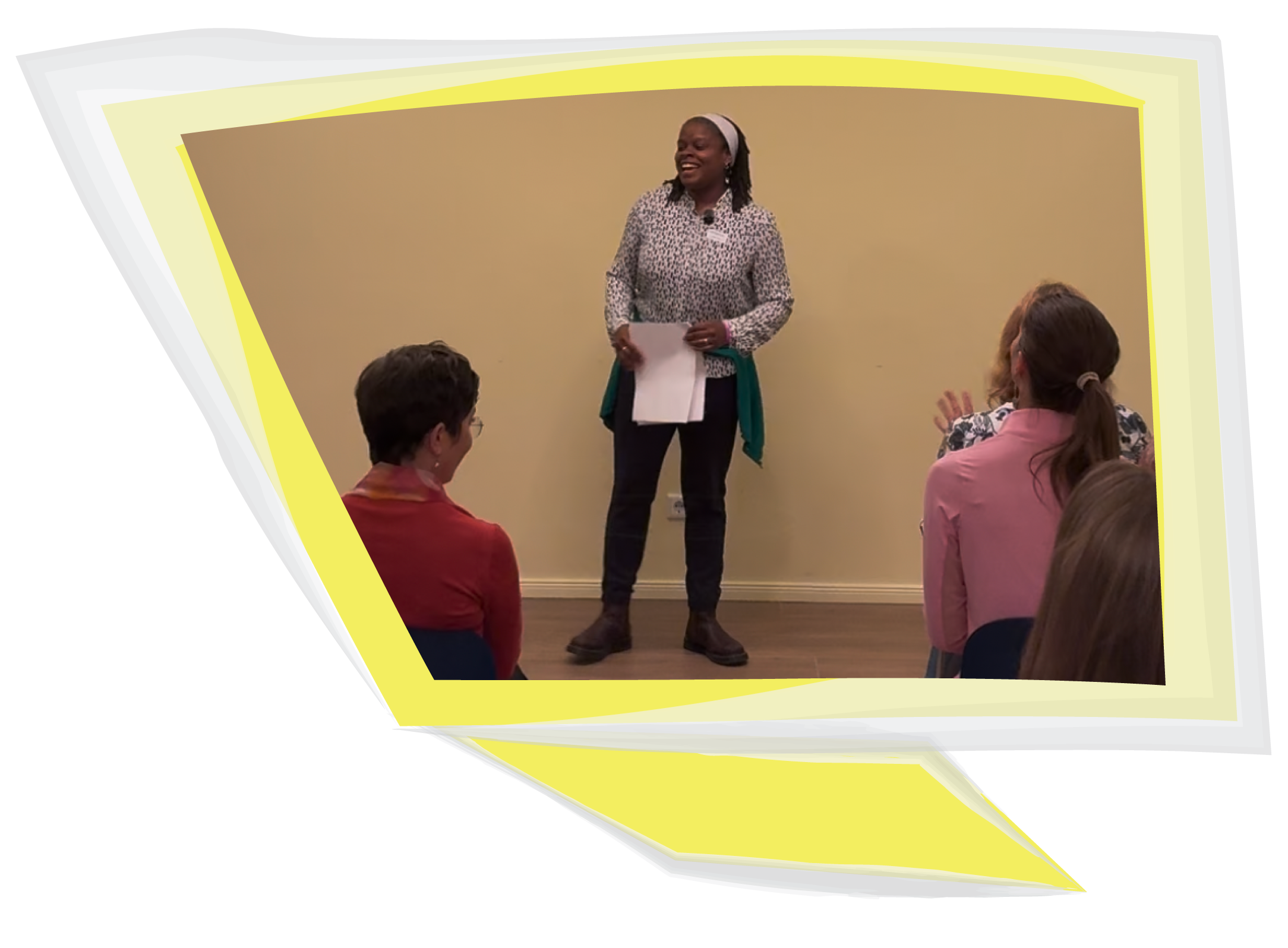 From a Veronica Louis Workshop: Photo of Veronica Louis in front of a room of people—leading a workshop.