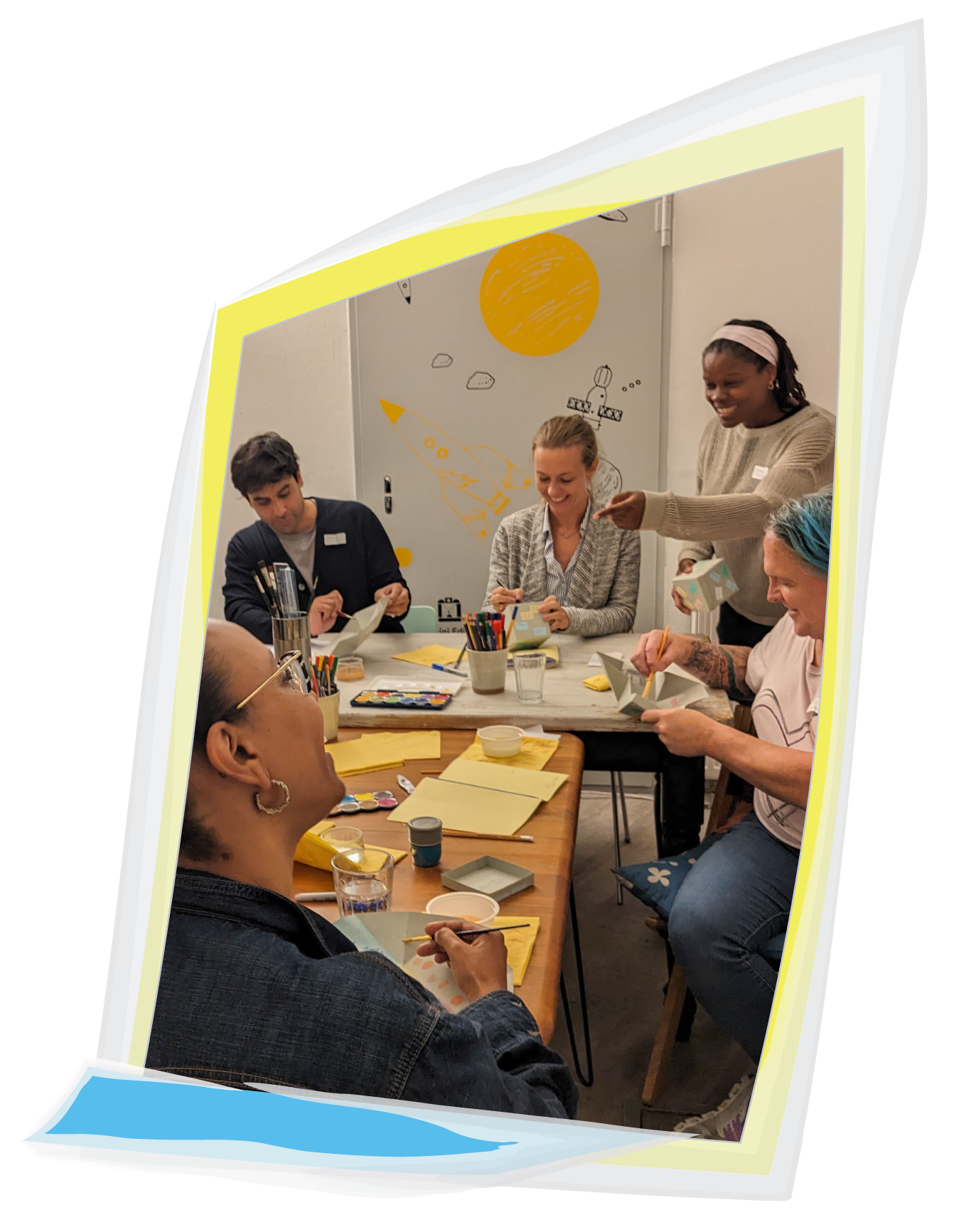 From a Veronica Louis Workshop: Photo of Veronica Louis leading an UnMake Your Box workshop with a handful of people.