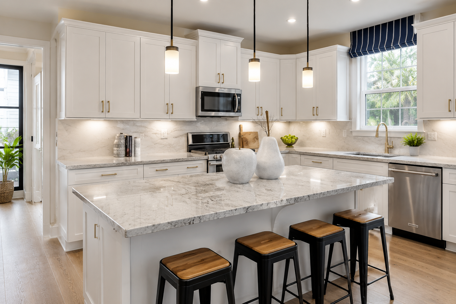 Contemporary kitchen showcasing white quartz countertops, oversized island, custom cabinetry, pendant lighting, and expert quartz countertop fabrication and installation in South Florida.