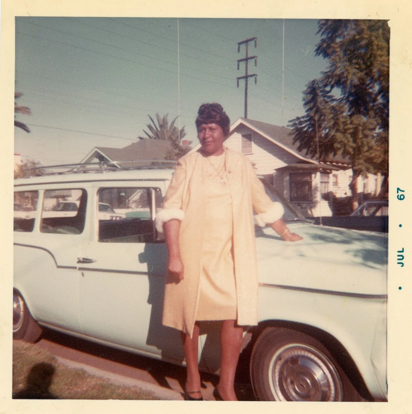 1970s. A woman poses with her car. ⁠
⁠
Photographer &amp; Location Unknown.