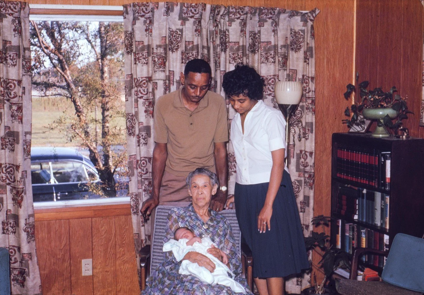 Family lets grandma hold the new member of the family, September of 1961. Kodachrome shot.⁠
⁠
Learn more about We The Diaspora at wethediaspora.org