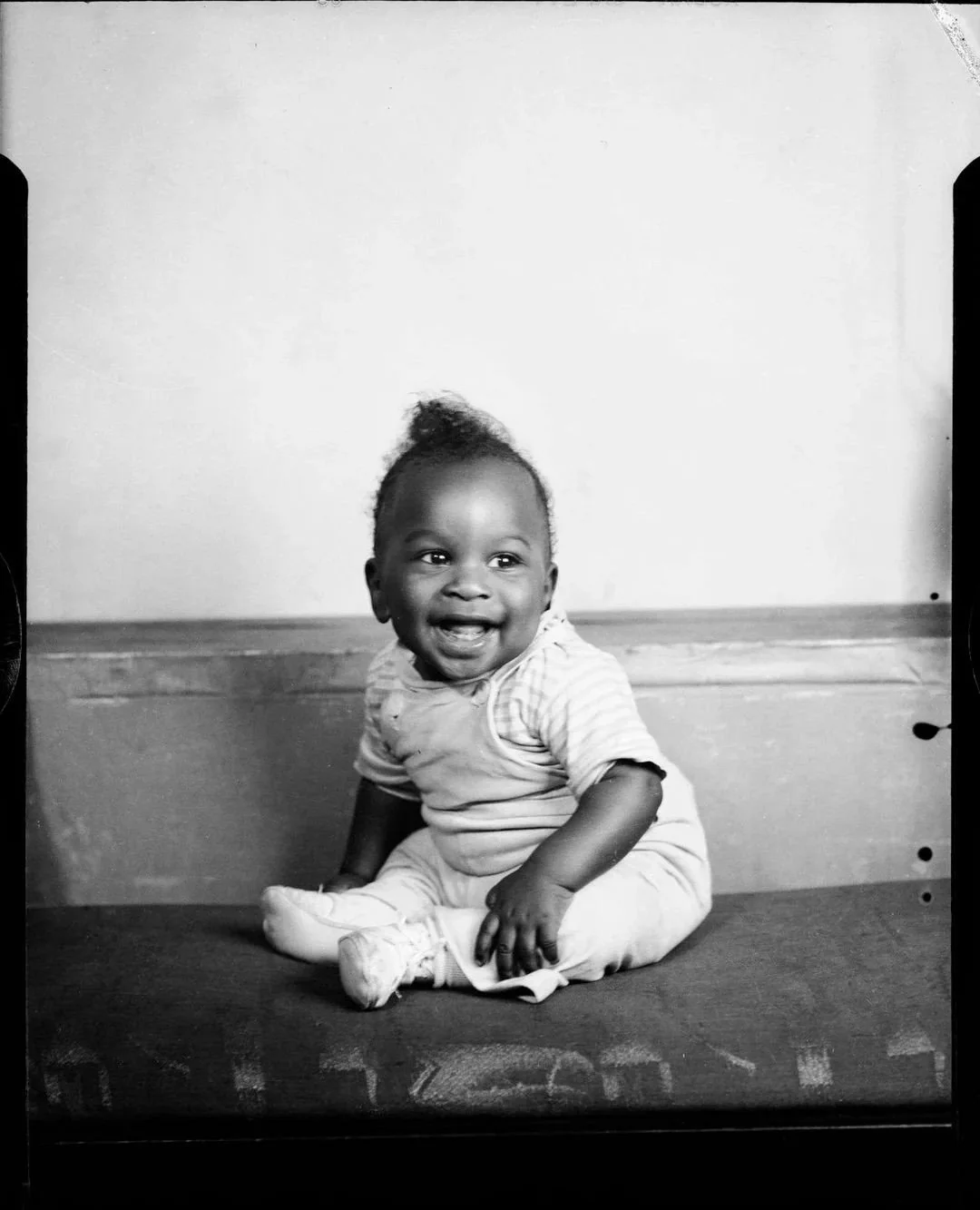 Baby smiling and posing for their sole photos, Safety film, 1940.⁠
⁠
Via Reddit Electrical-Aspect-13⁠
⁠
Learn more at wethediaspora.org