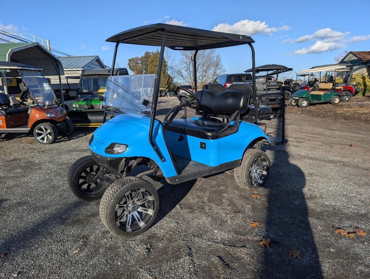 2018 EZGO TXT Gas | 13HP Kawasaki | Lifted Golf Cart with Flip Seat | United Metro Golf Cart