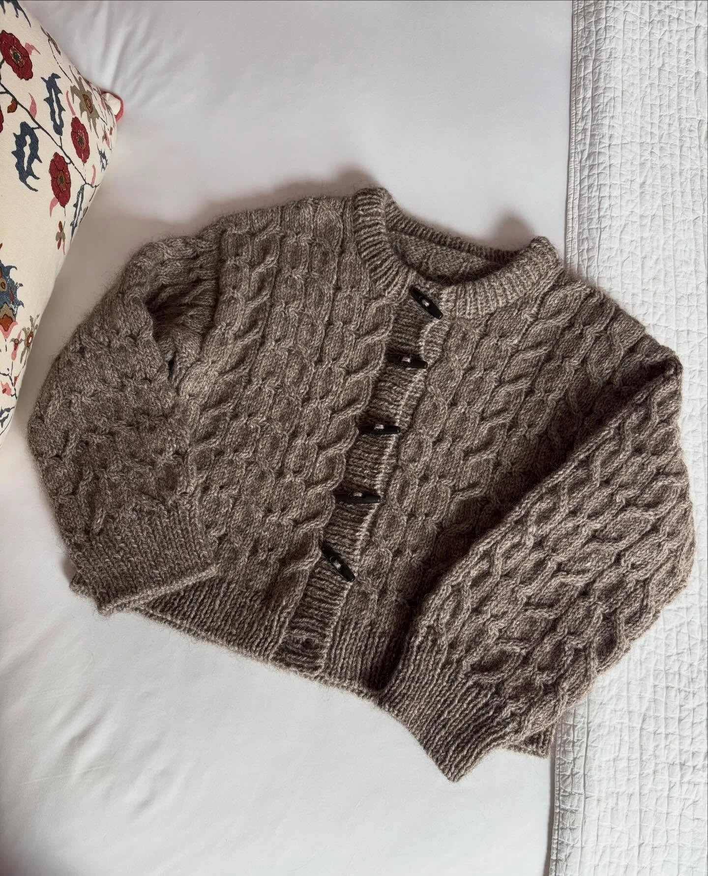 A labor of love: an almost** finished #amourcardigan (**because the sleeves became extra long in blocking and I still have to go back and shorten them!). 
.
This is a true beefcake of a knitted jacket and I hope it&rsquo;ll keep me warm for many year