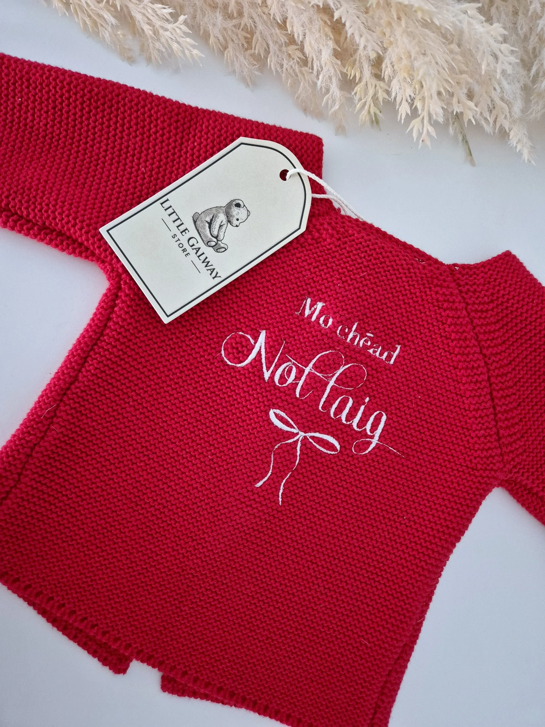 Introducing our gorgeous Christmas Red knit cardigan. A beautiful shade of red, perfect for the festive season and beyond! Beautifully soft, cosy knit, this timeless little cardigan is the sweetest ad