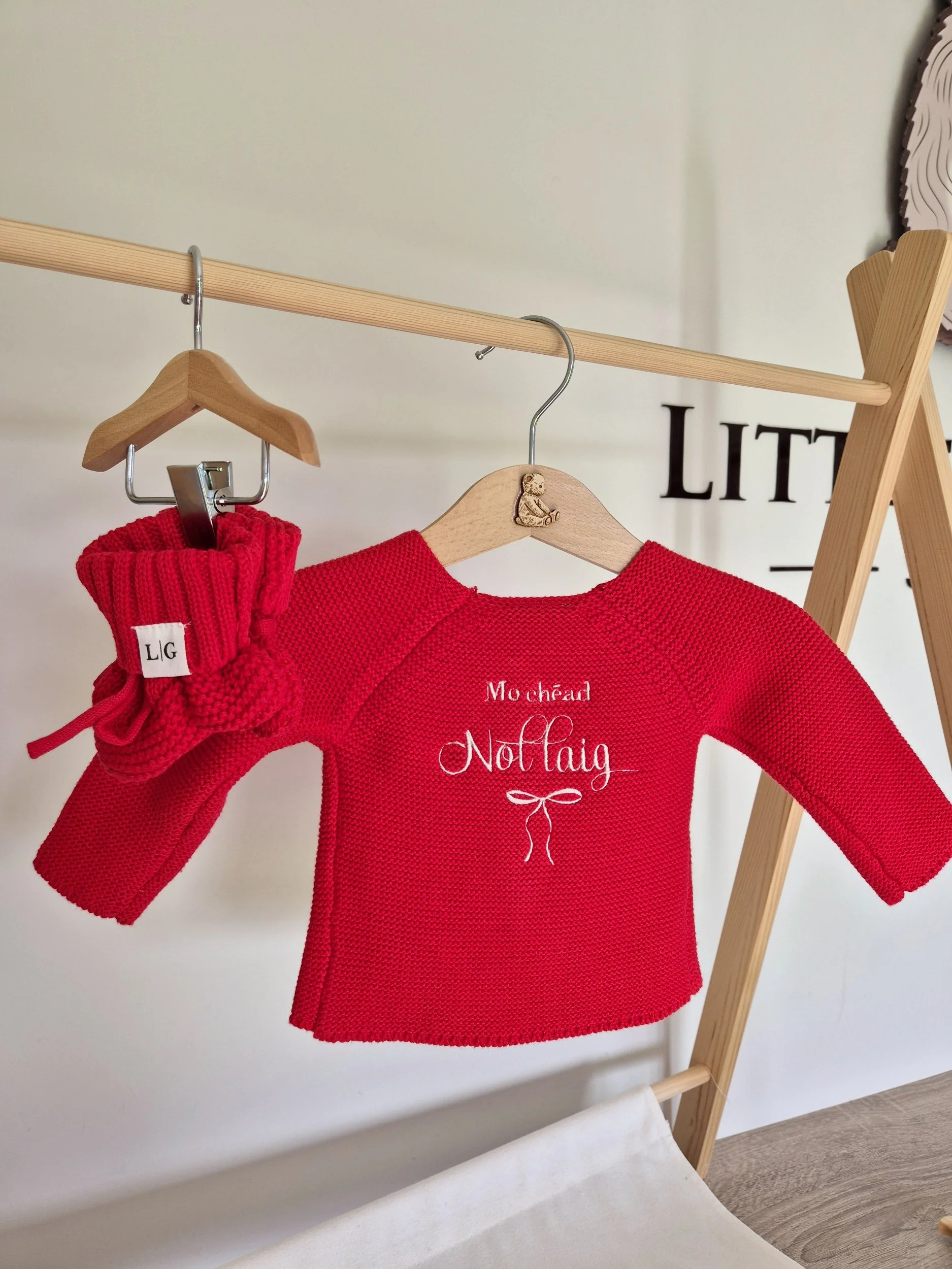 Keep those tiny toes snug and festive with our cosy christmas red knit booties