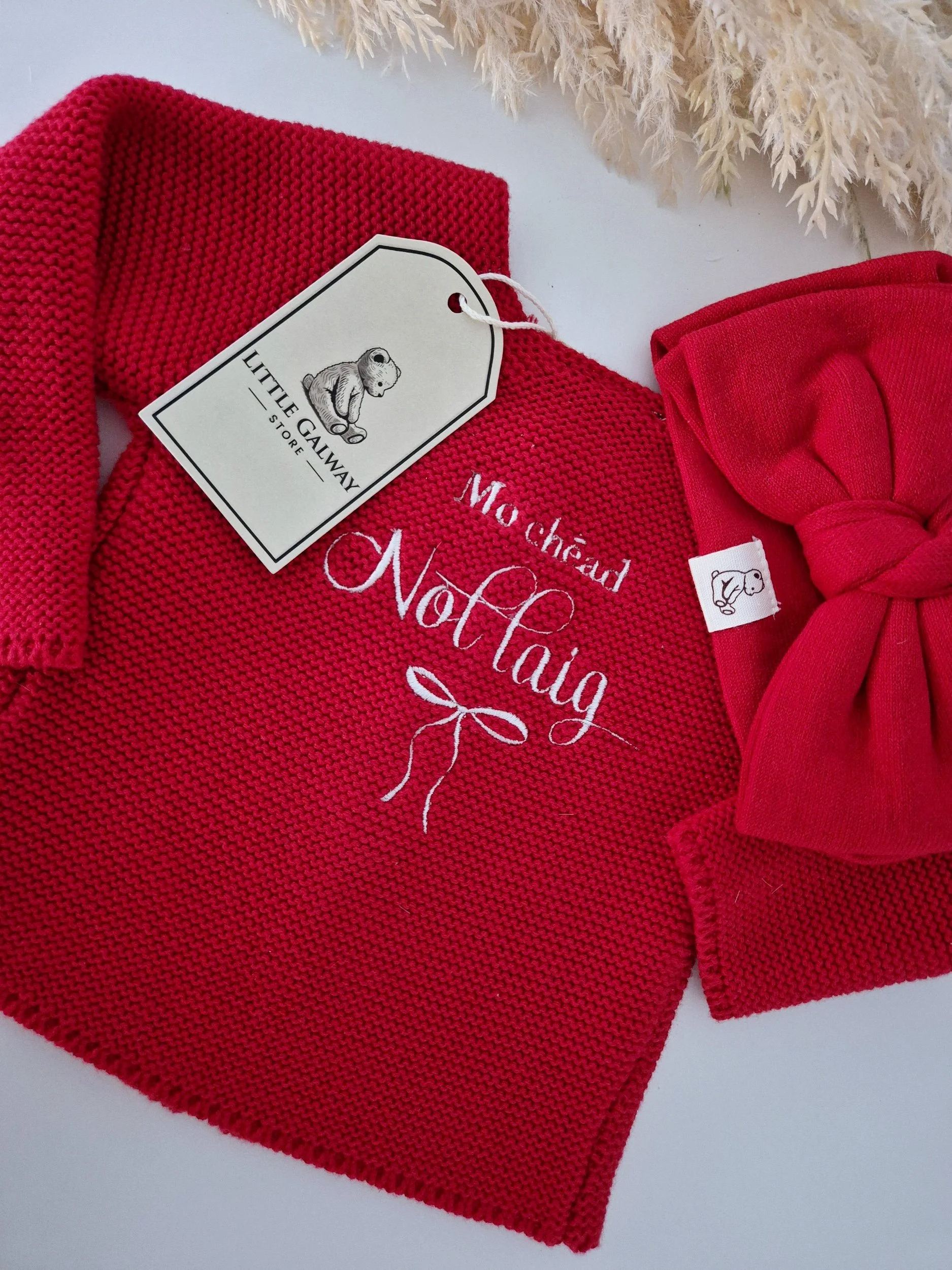 Introducing our gorgeous Christmas Red knit cardigan. A beautiful shade of red, perfect for the festive season and beyond! Beautifully soft, cosy knit, this timeless little cardigan is the sweetest ad