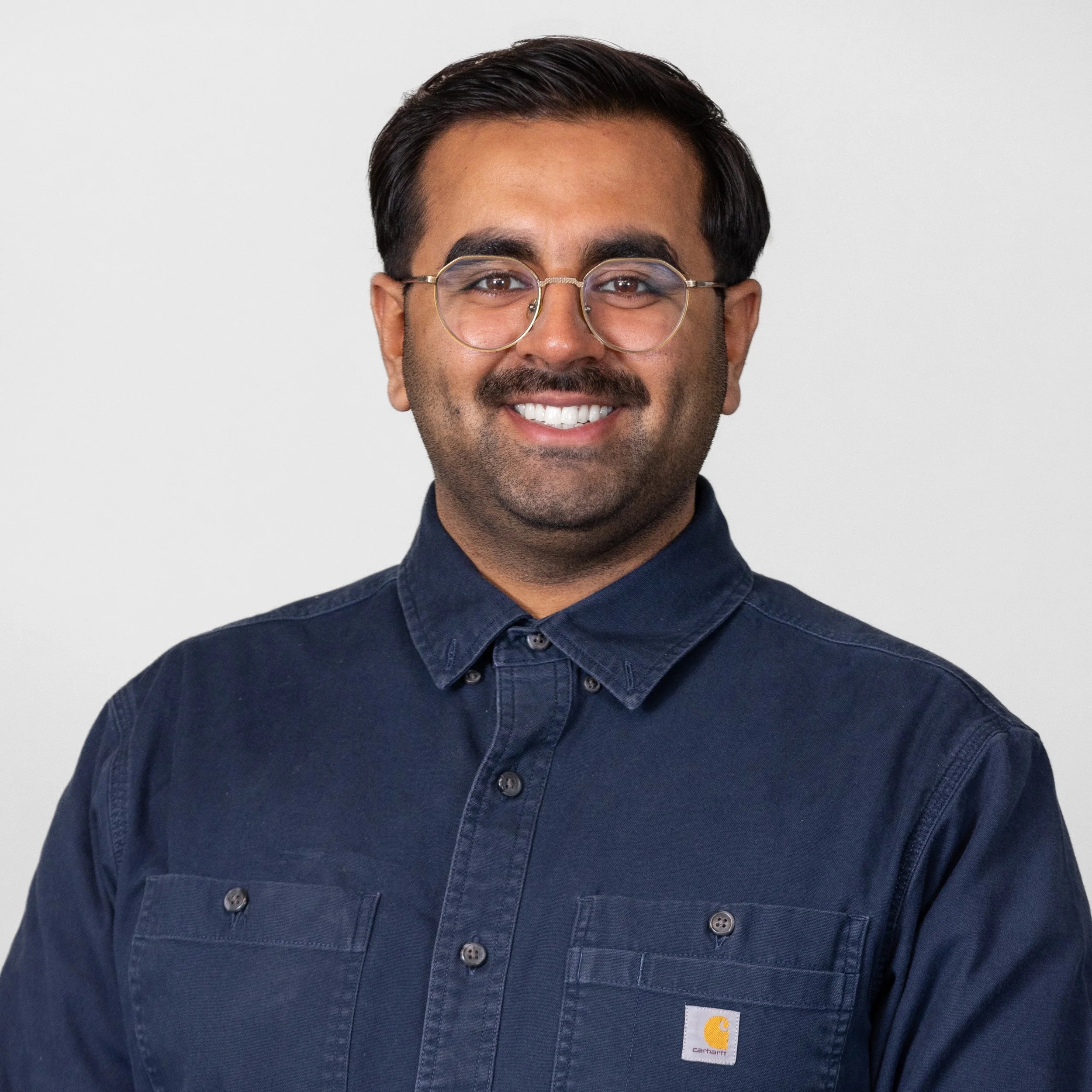 Ahmed Altaf JJ Welch Headshot High Res-3.jpg