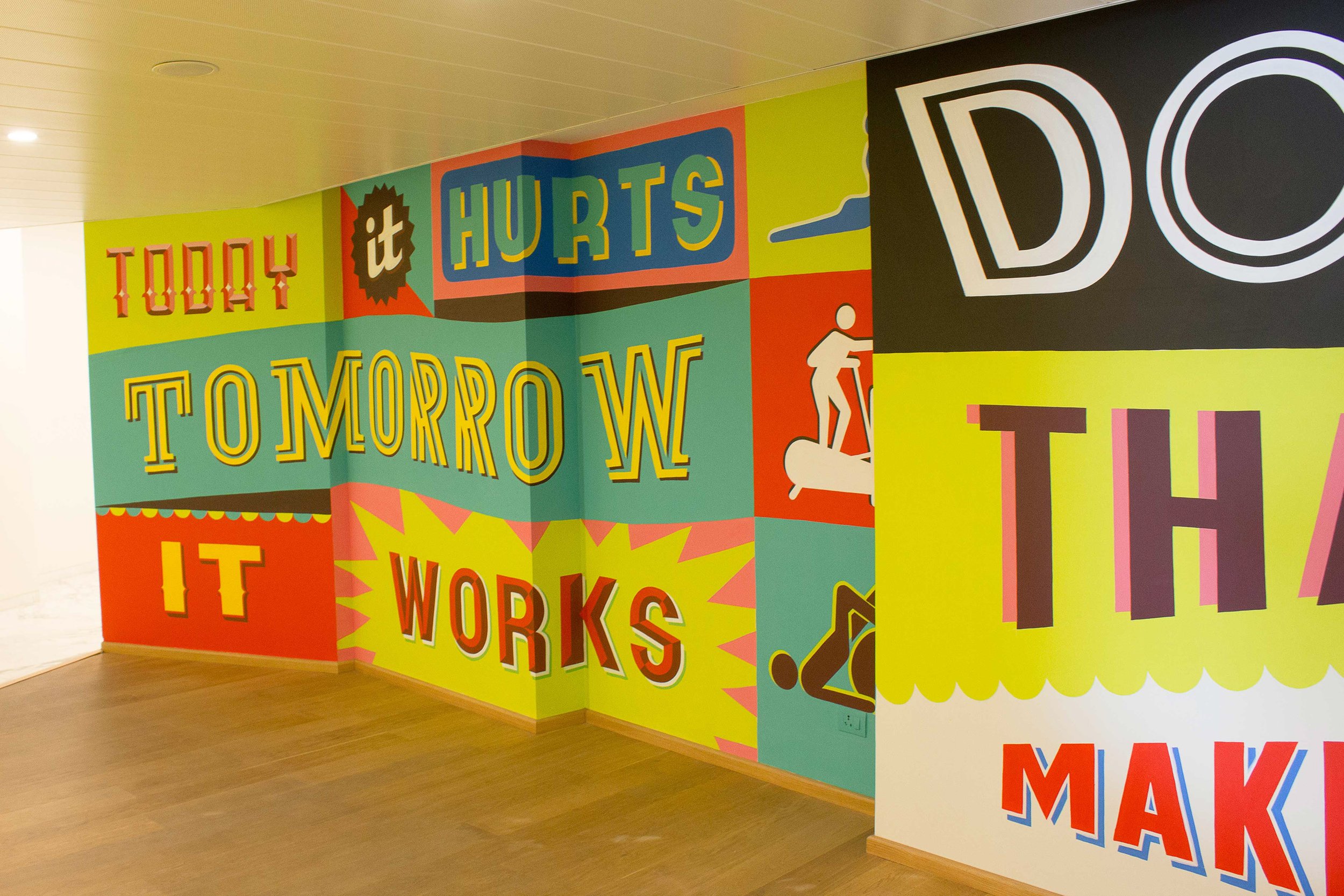 Typographical Wall Mural Recharge by award winning Indian Designer