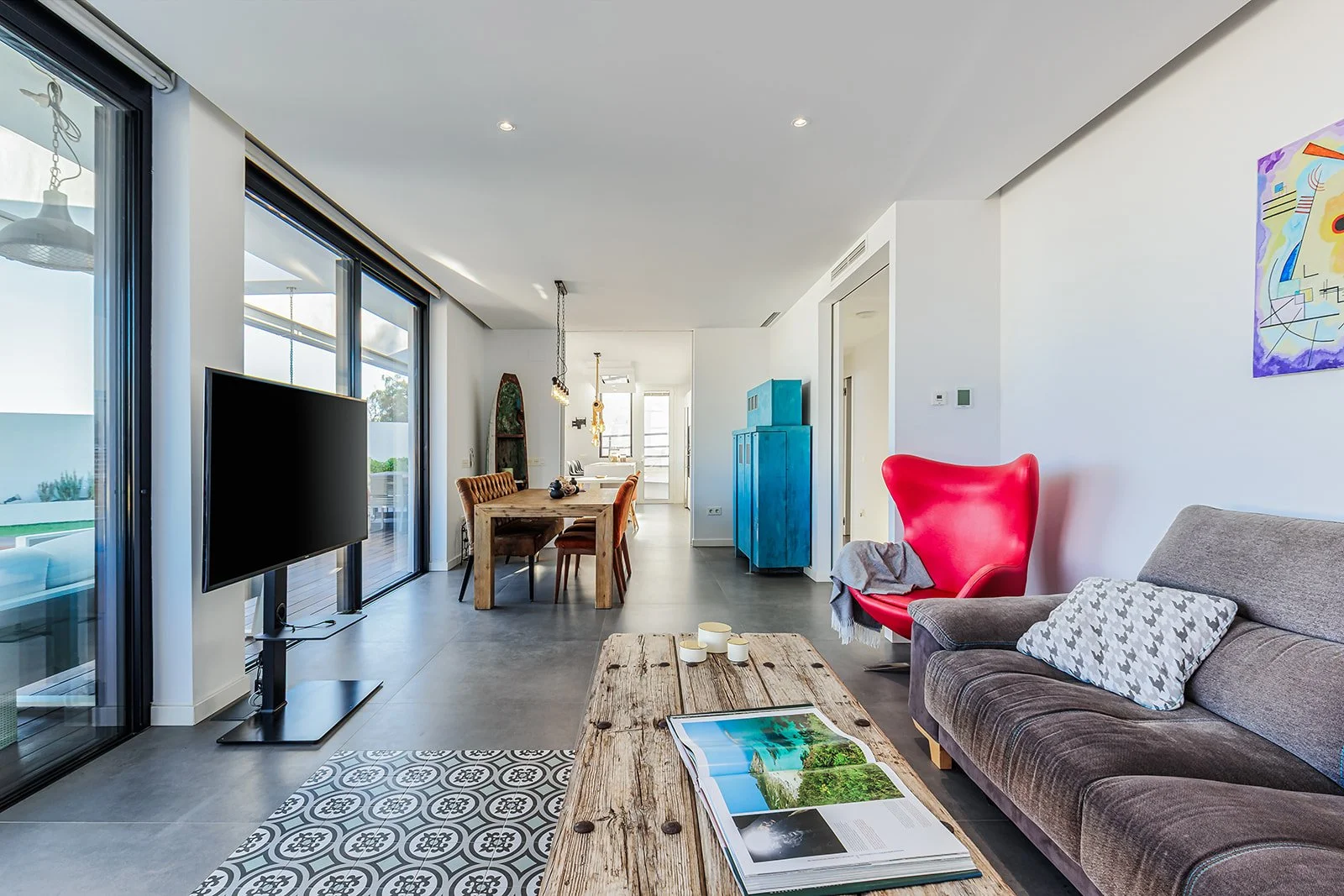 Open plan living and dining space photographed for luxury property listing
