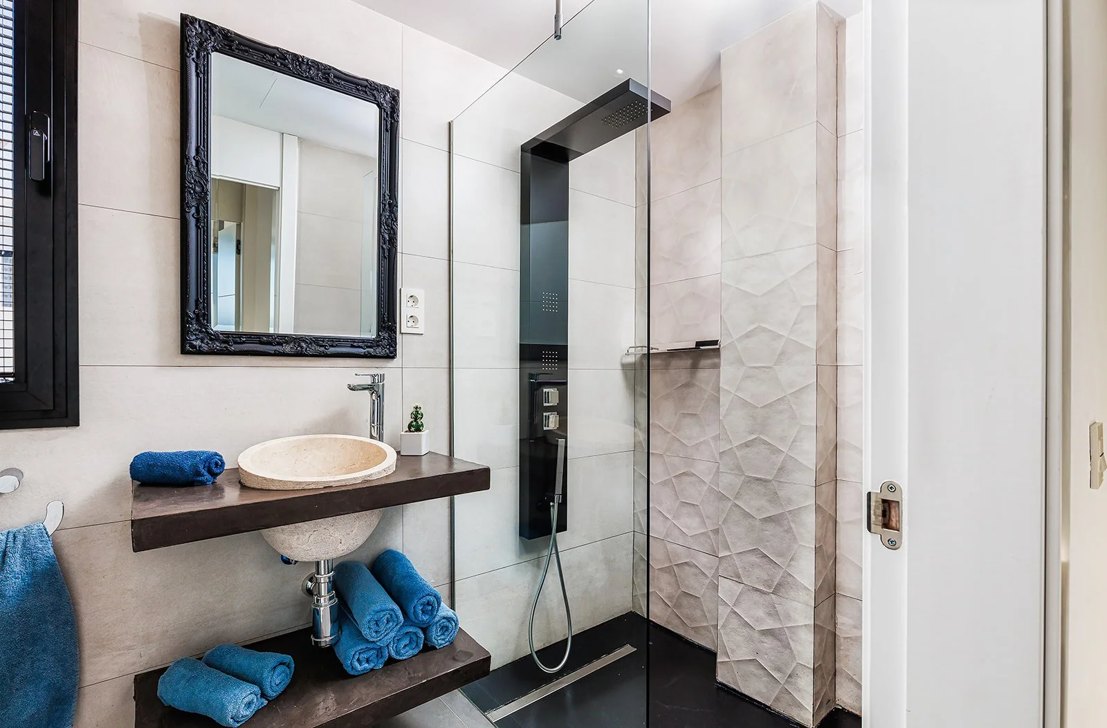 Stylish guest bathroom photographed for Marbella real estate listing
