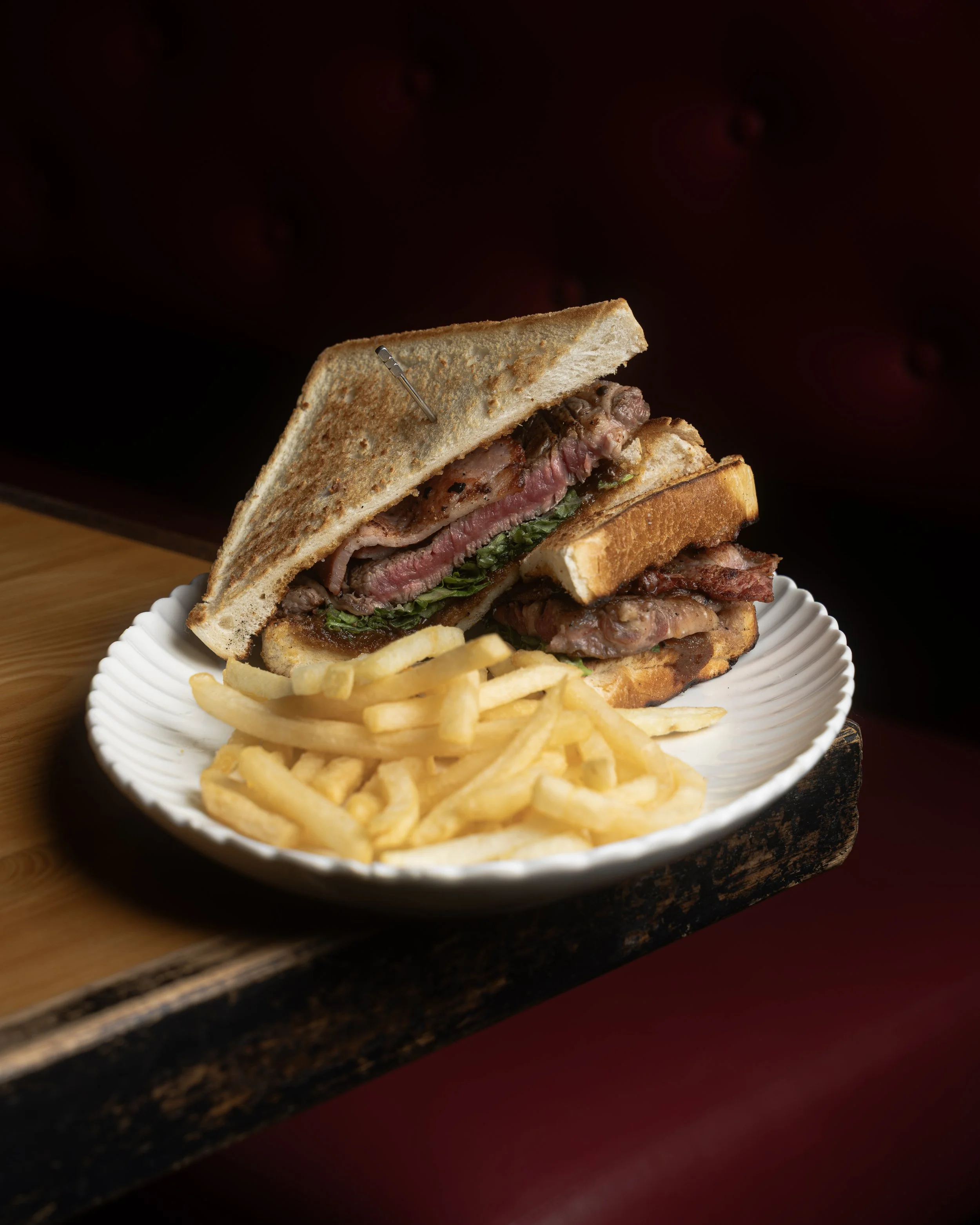Pasture Raised Scotch fillet Steak Sandwich with free-range Scottsdale tas oak smoked bacon, Manna Bakehouse brioche & Rockwall house-made tomato relish.