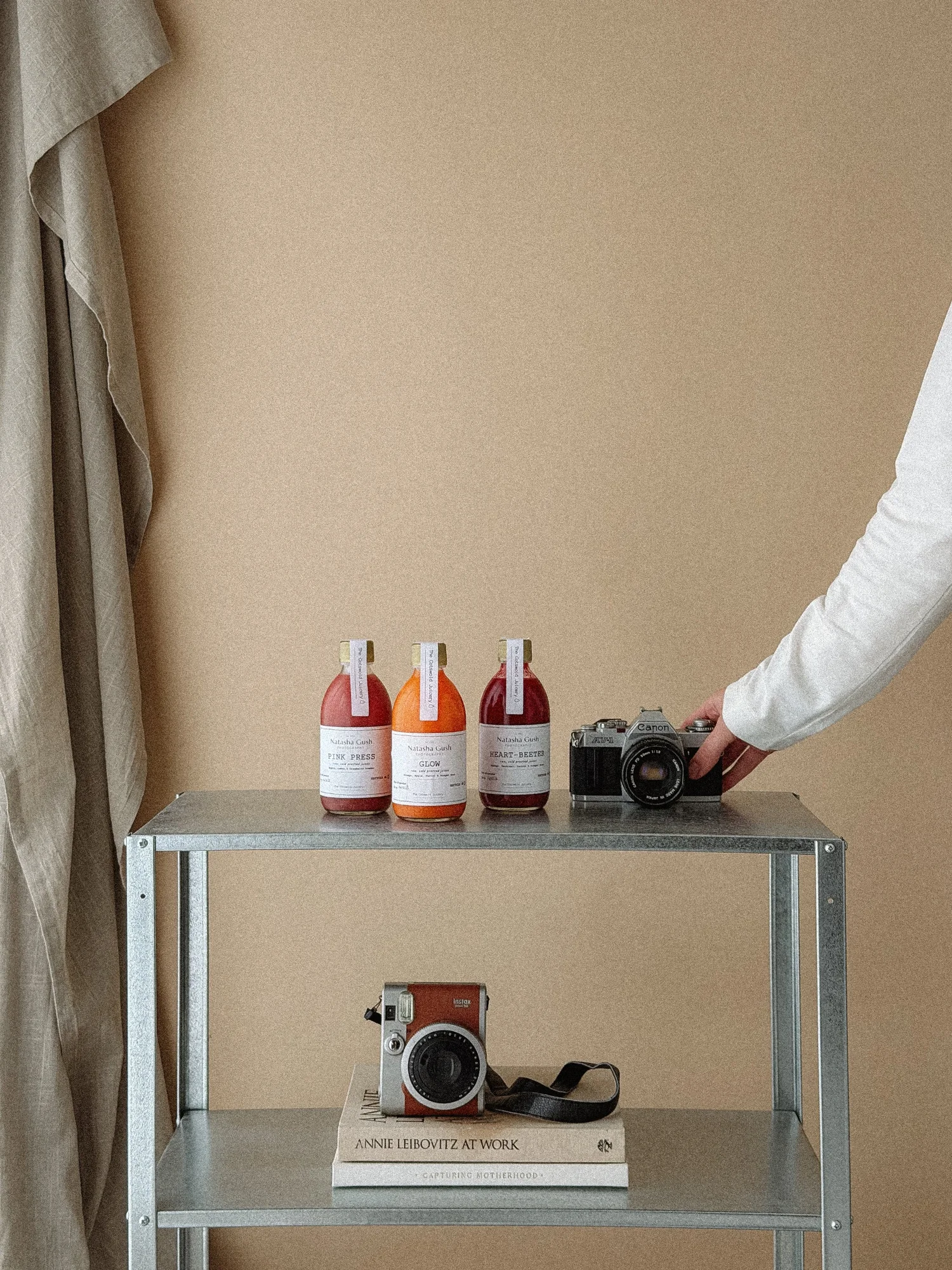 Branded drinks and cameras in Natasha’s photography studio