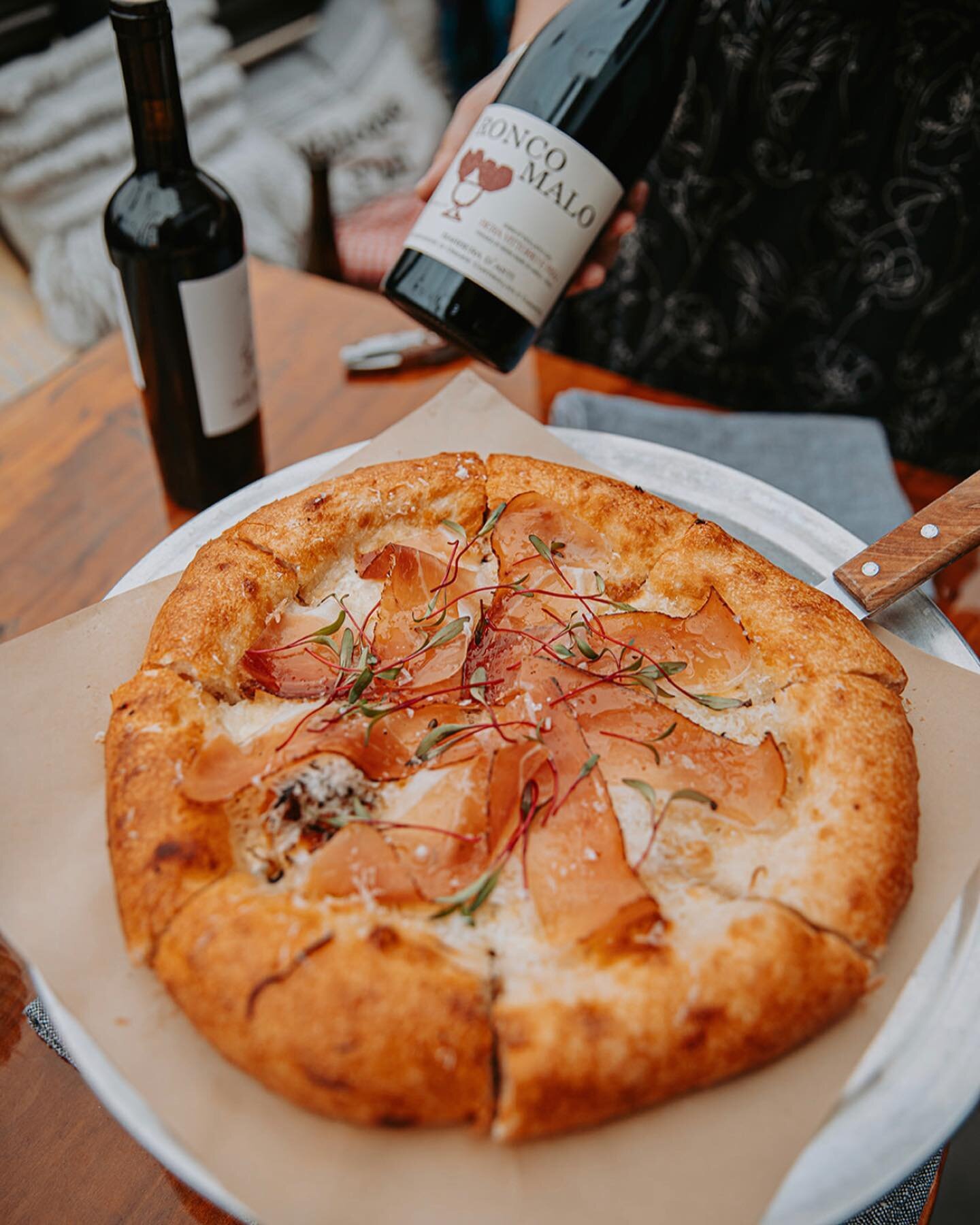 The simplicity of Italian food is what sets it apart. The quality of ingredients is what keeps us going back. A light cream sauce, leeks, Grana Padano and thinly sliced Prosciutto on top of our home made dough. And the dough has only four ingredients