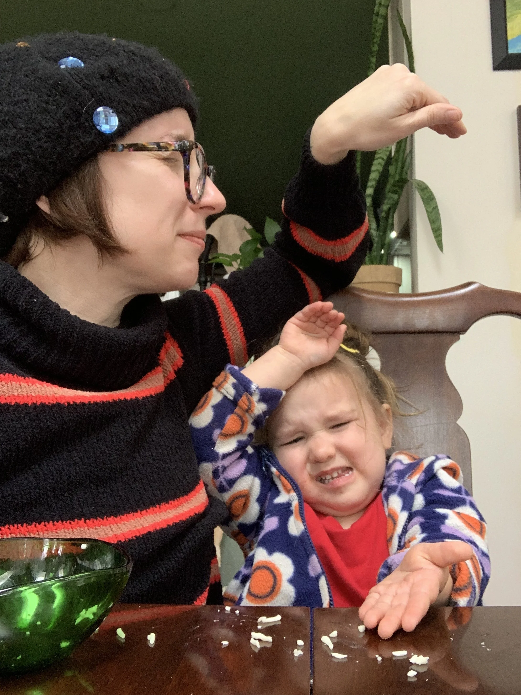 Ada & Ashy dancing at the dining table, 2023