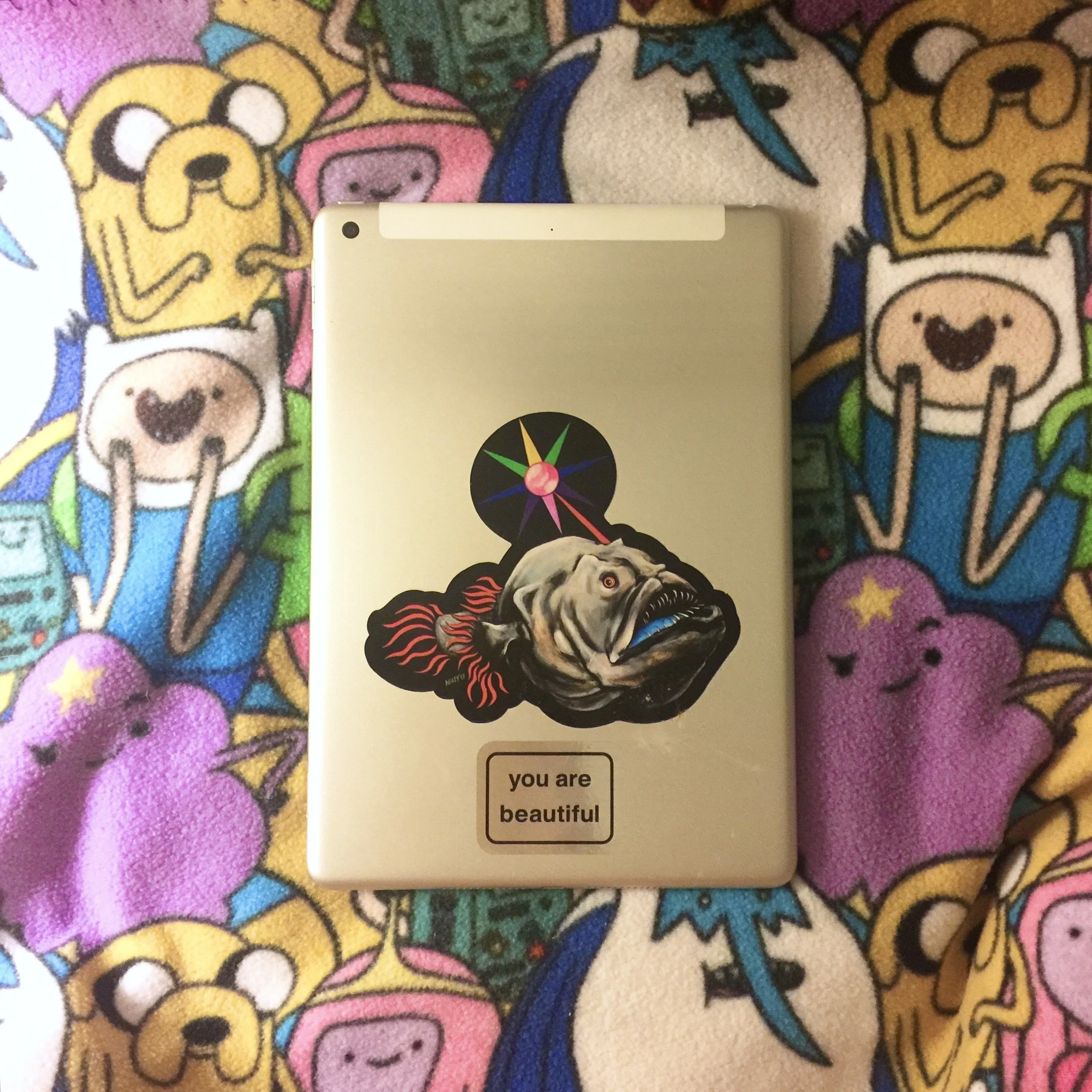 angler fish sticker on Lory's ipad