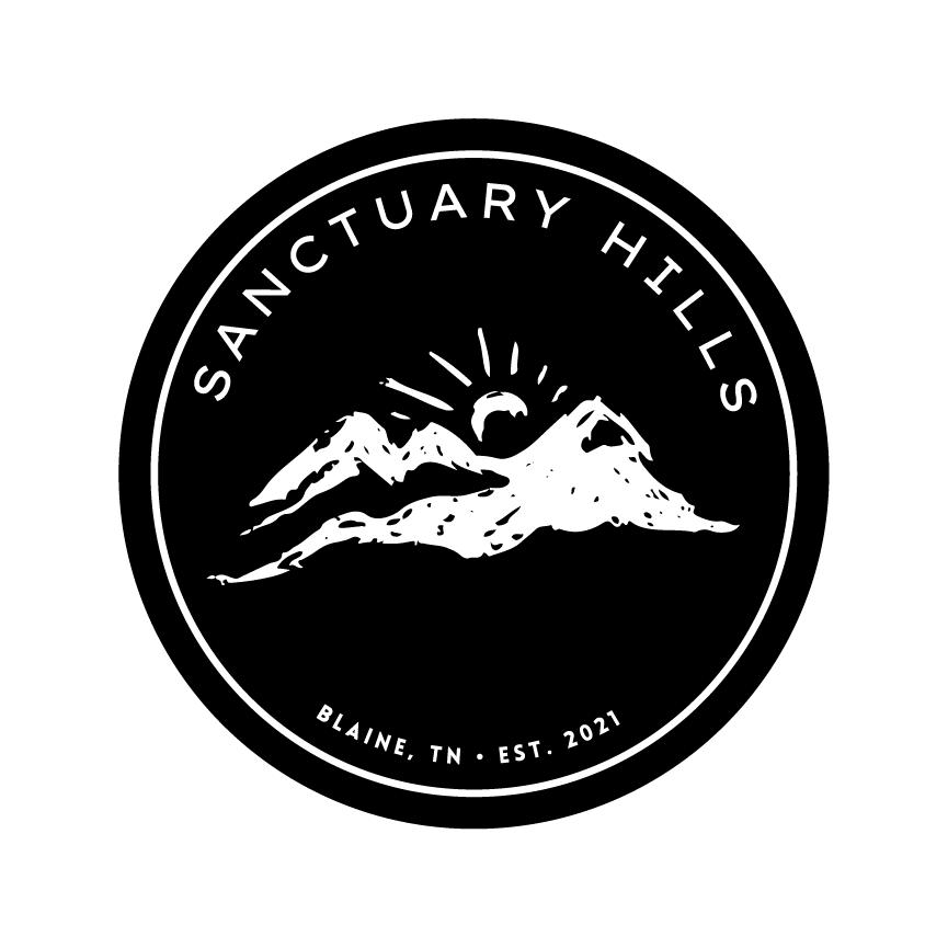 sanctuary-hills-badge-logo-white-black background.png