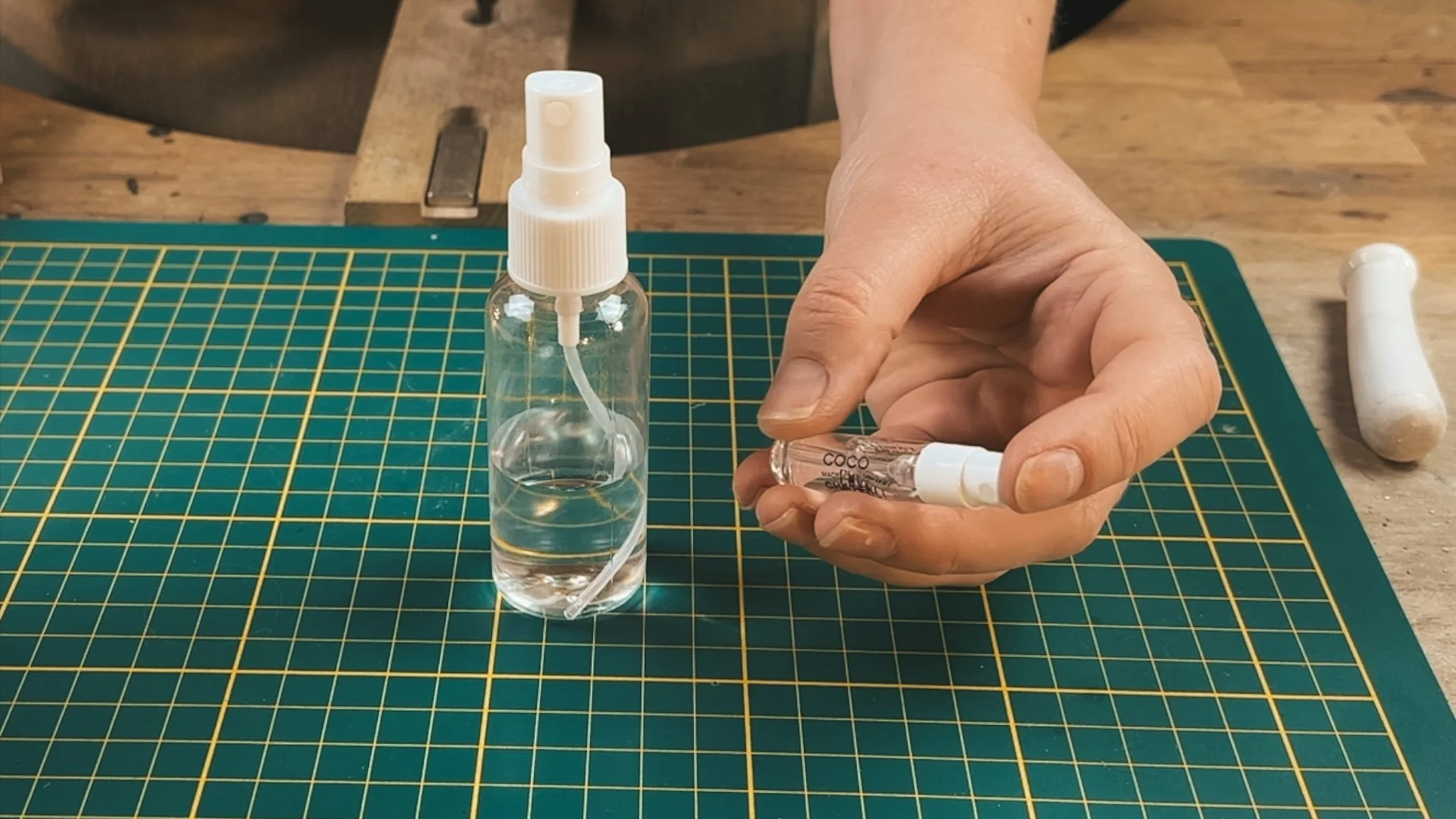 Step 6. Fill a spray bottle or perfume sample bottle with deionised water and mist the silver clay powder. 
