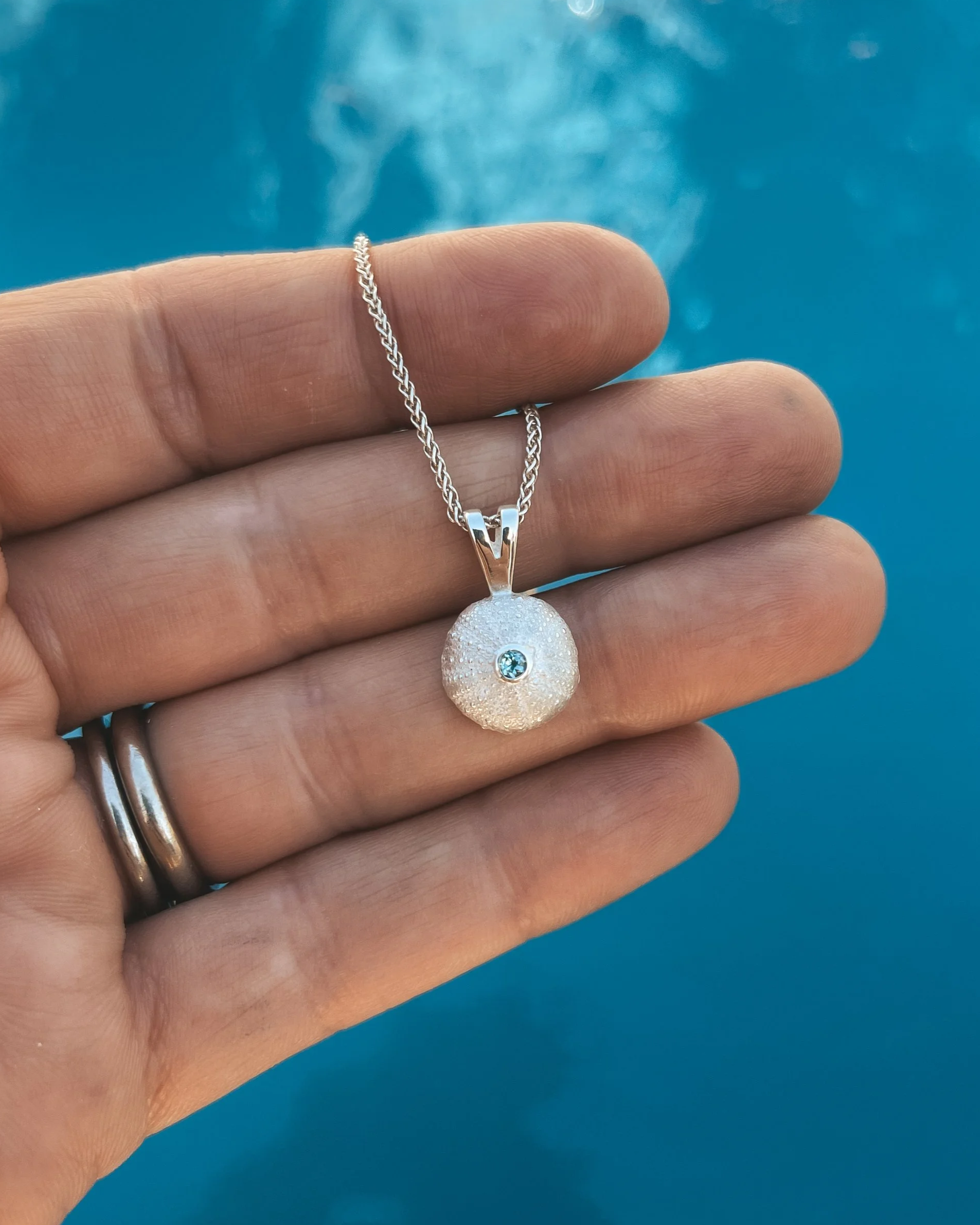 silver+urchin+necklace+with+gemstone.png