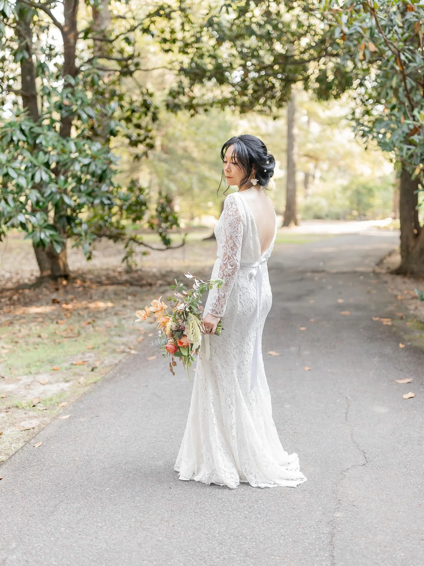 Ruth: in the gown she purchased before even meeting her husband. Accented by a stunning @jtokheim bouquet.
