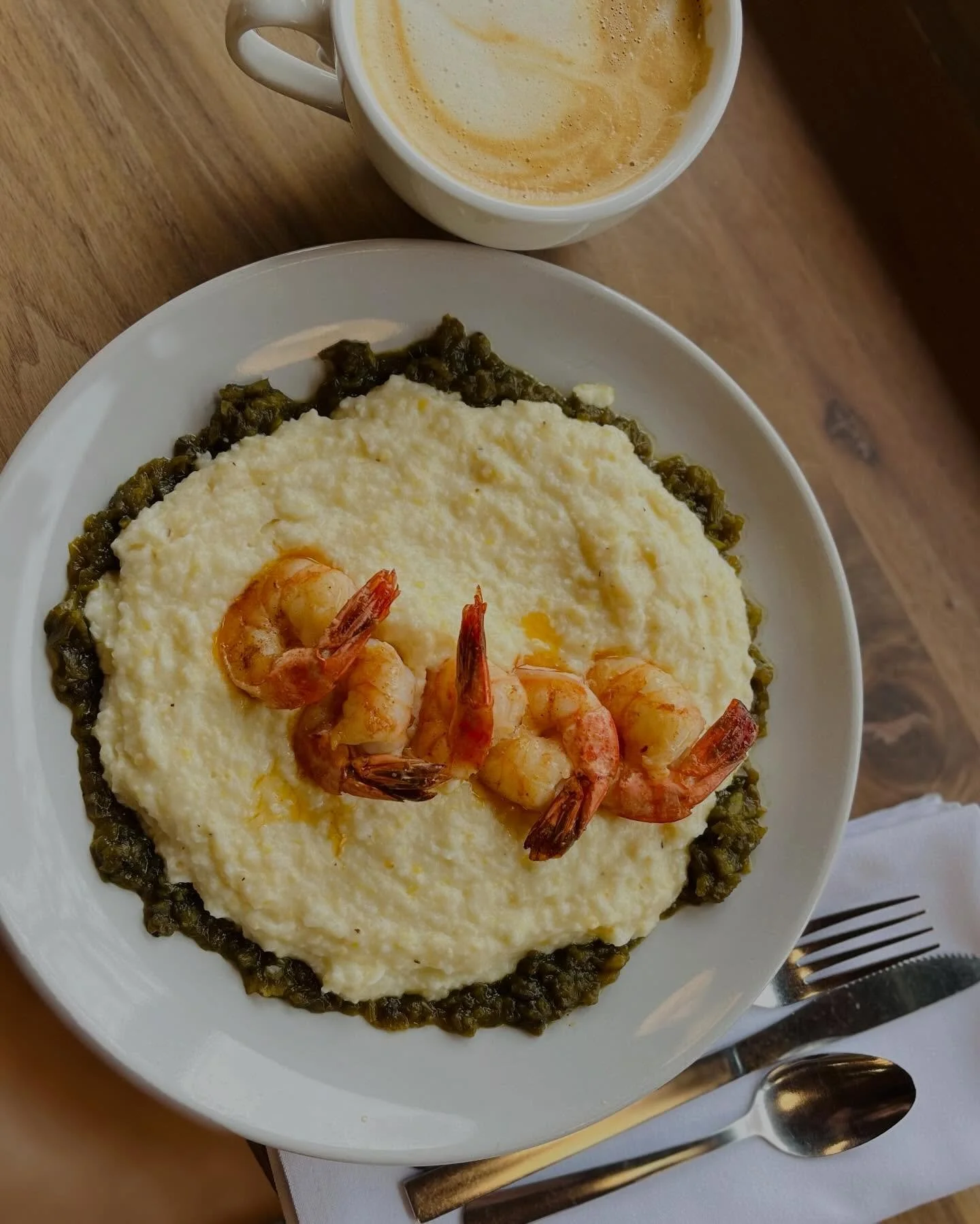 Breakfast is served. 

#shrimpandgrits #latte #birdstheword #theearlybirdeatery