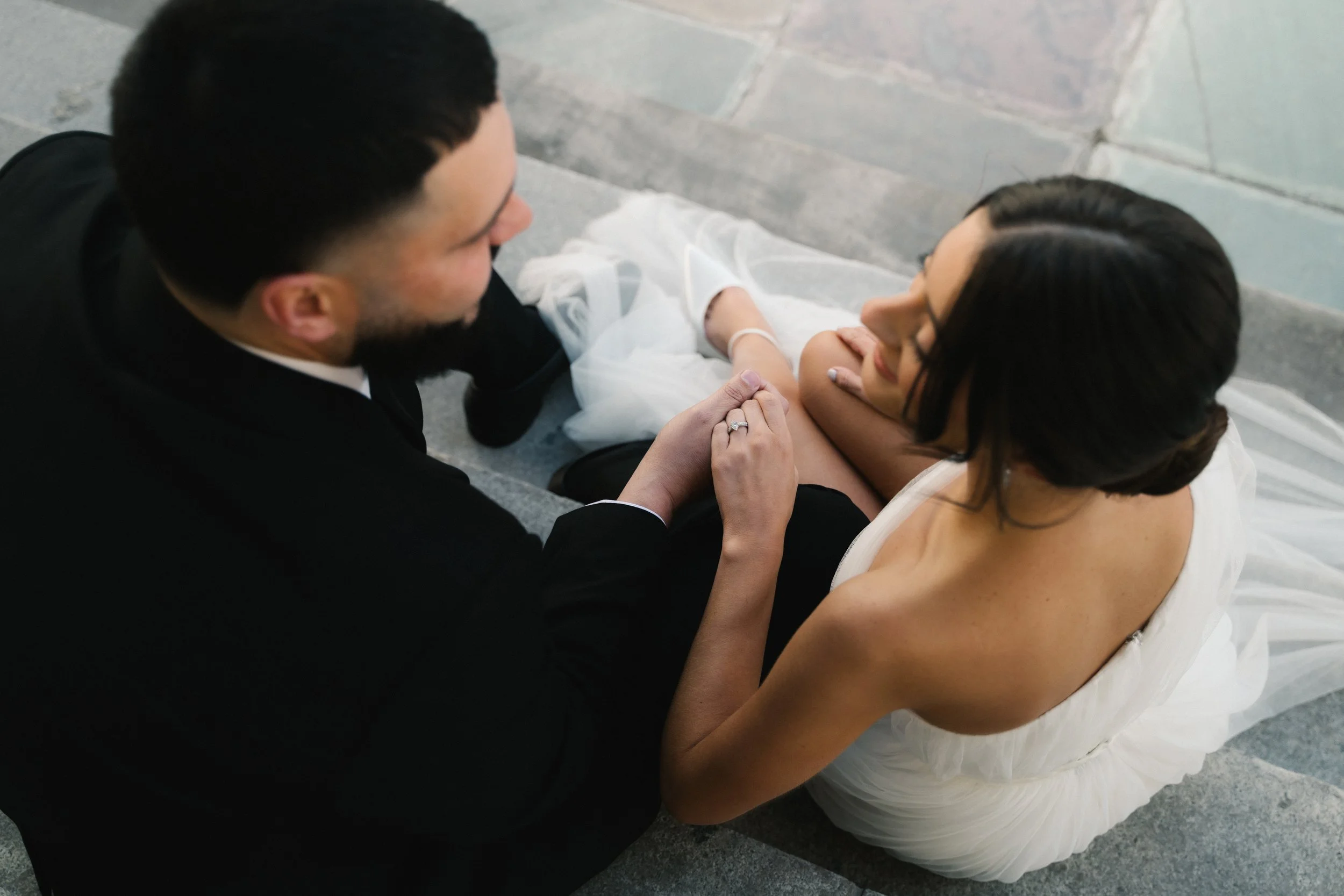 Newly married couple portraits outside Miami-Dade courthouse with classic architecture and natural editorial style 