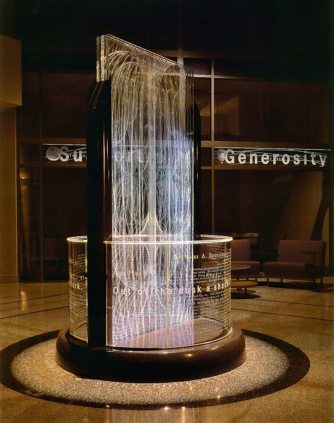 Thermoformed clear acrylic sign with white lettering and graphics, lit from below.