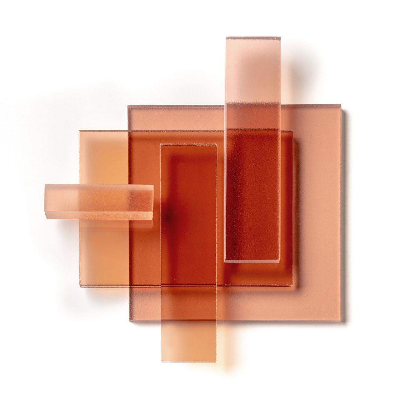 Abstract composition of layered translucent geometric shapes in warm orange and brown tones on a white background.