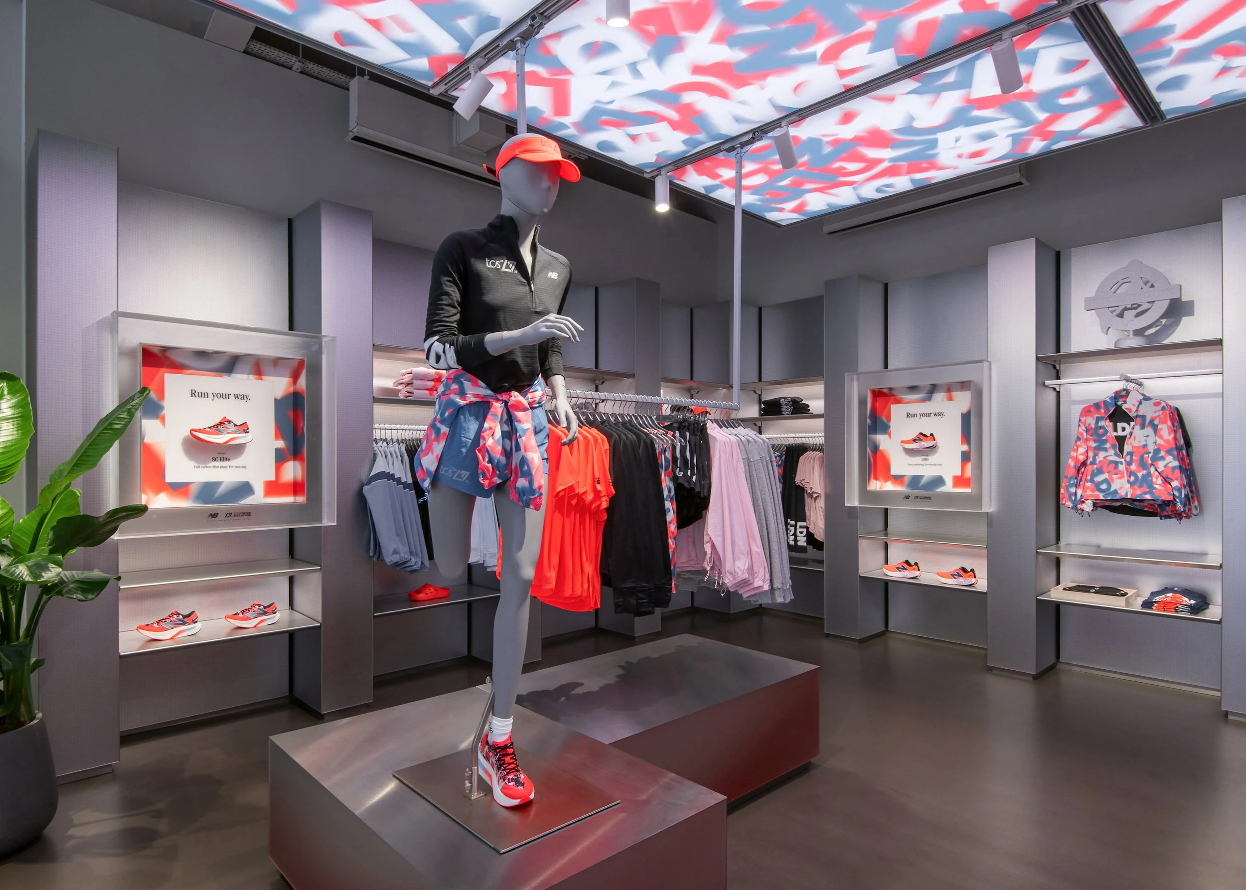 Multi-material assemblies: metal pedestal, wall mounted acrylic displays with graphics, integrated led lighting.