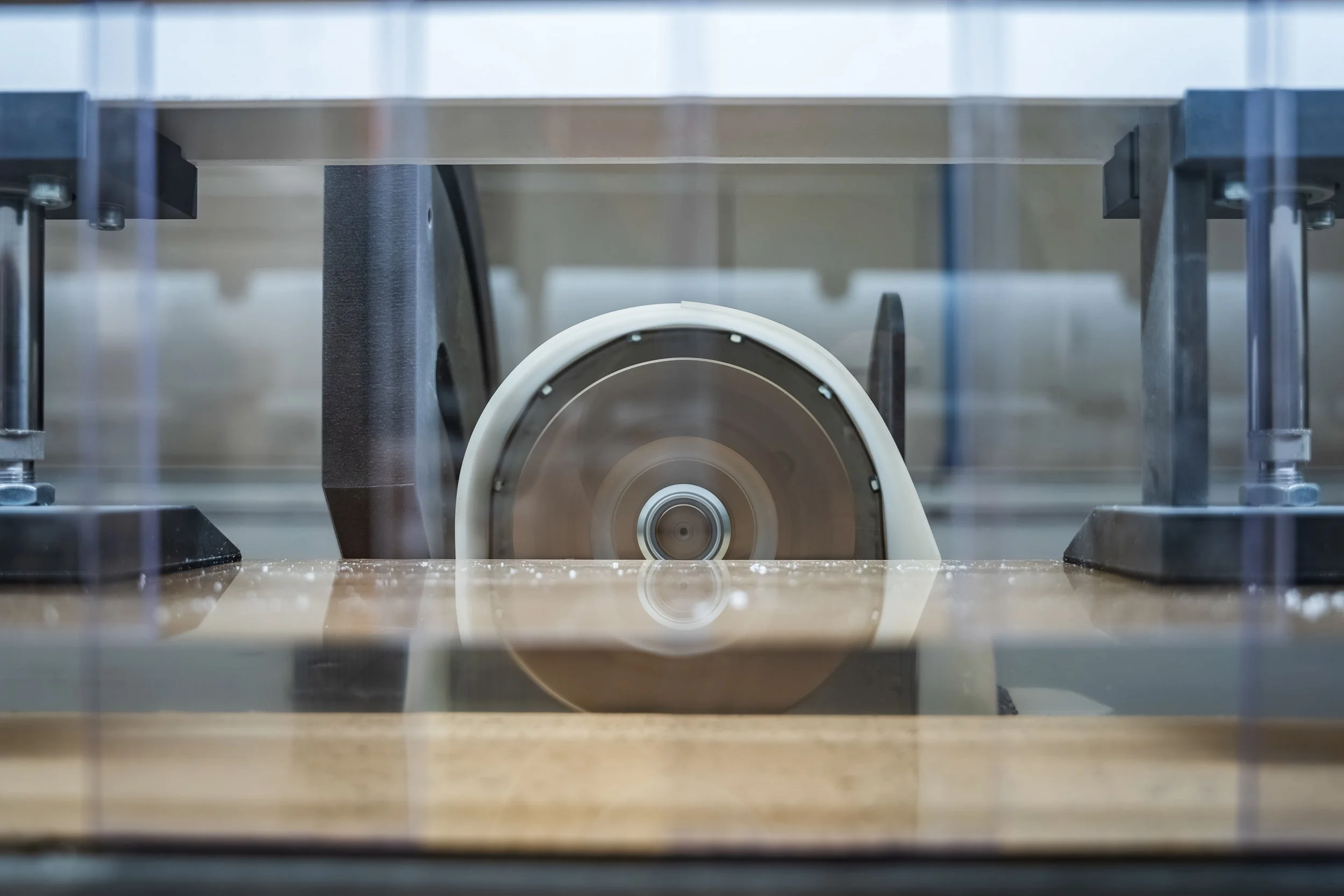 Machine polishing wheel used to produce optically clear edges on acrylic panels.