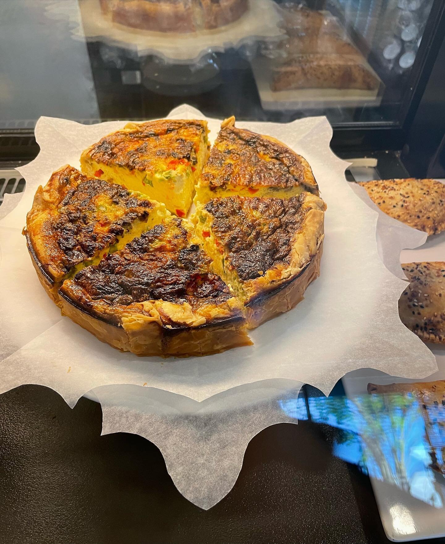 Our Veggie Quiche is a wonderful vegetarian option for breakfast! Baked fresh daily &amp; made in house by our bakery team. 

housemade pastry crust | savory egg custard | bell pepper | onion | mushroom | feta