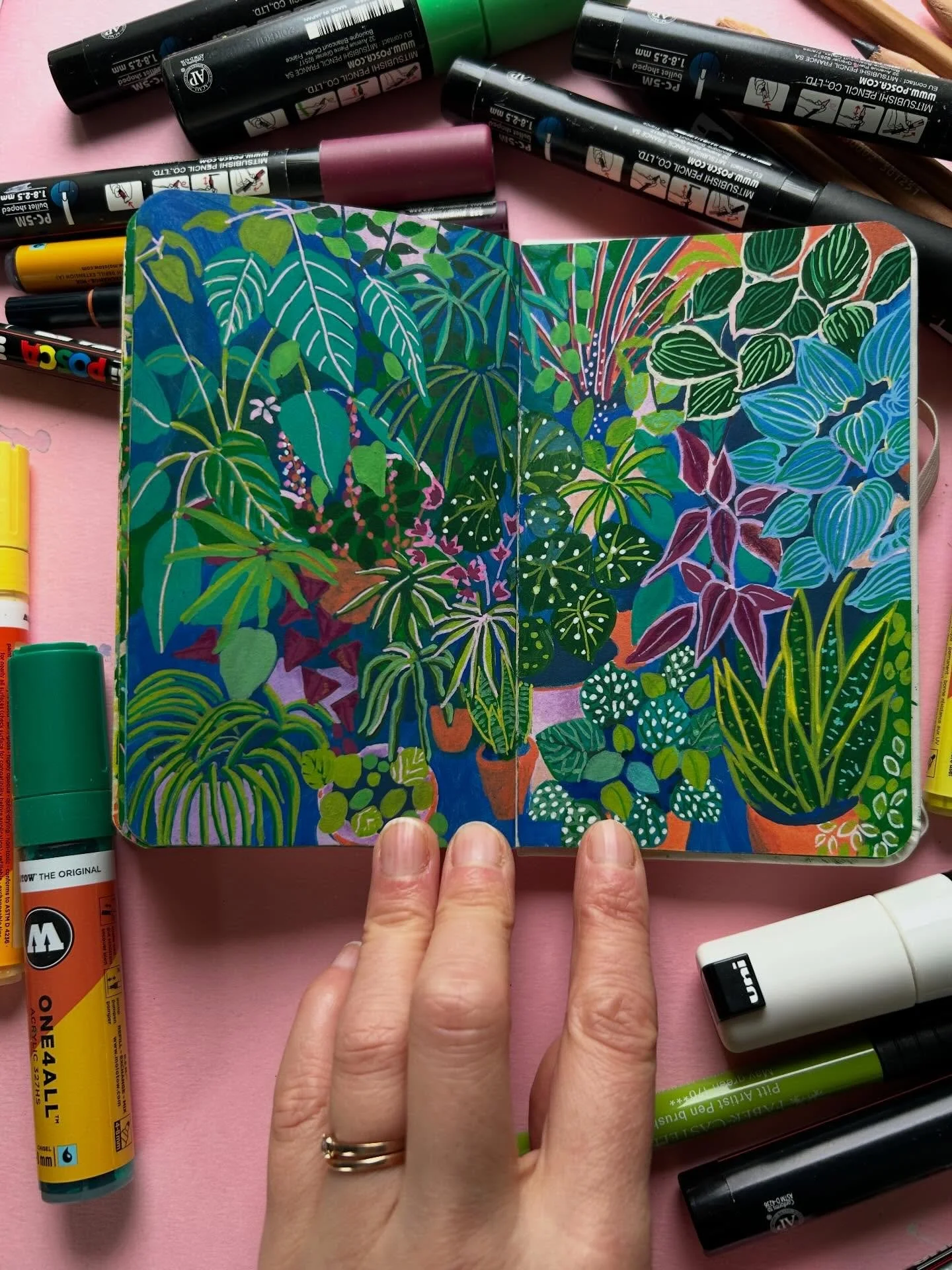 Sketchbooks, pens and pencils. I use a collection of @poscaoficial and @molotowheadquarters marker acrylic pens. This is generally how my desk looks when I&rsquo;m in drawing mode. I still feel like I&rsquo;m experimenting and playing with colour, li