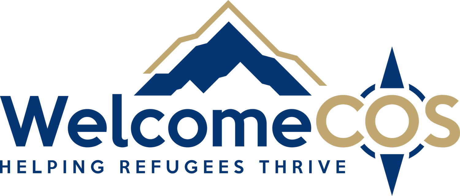 Logo for Welcome COS with a mountain graphic above the text and a compass symbol around the 'O' in 'COS'. The tagline reads 'Helping Refugees Thrive.'