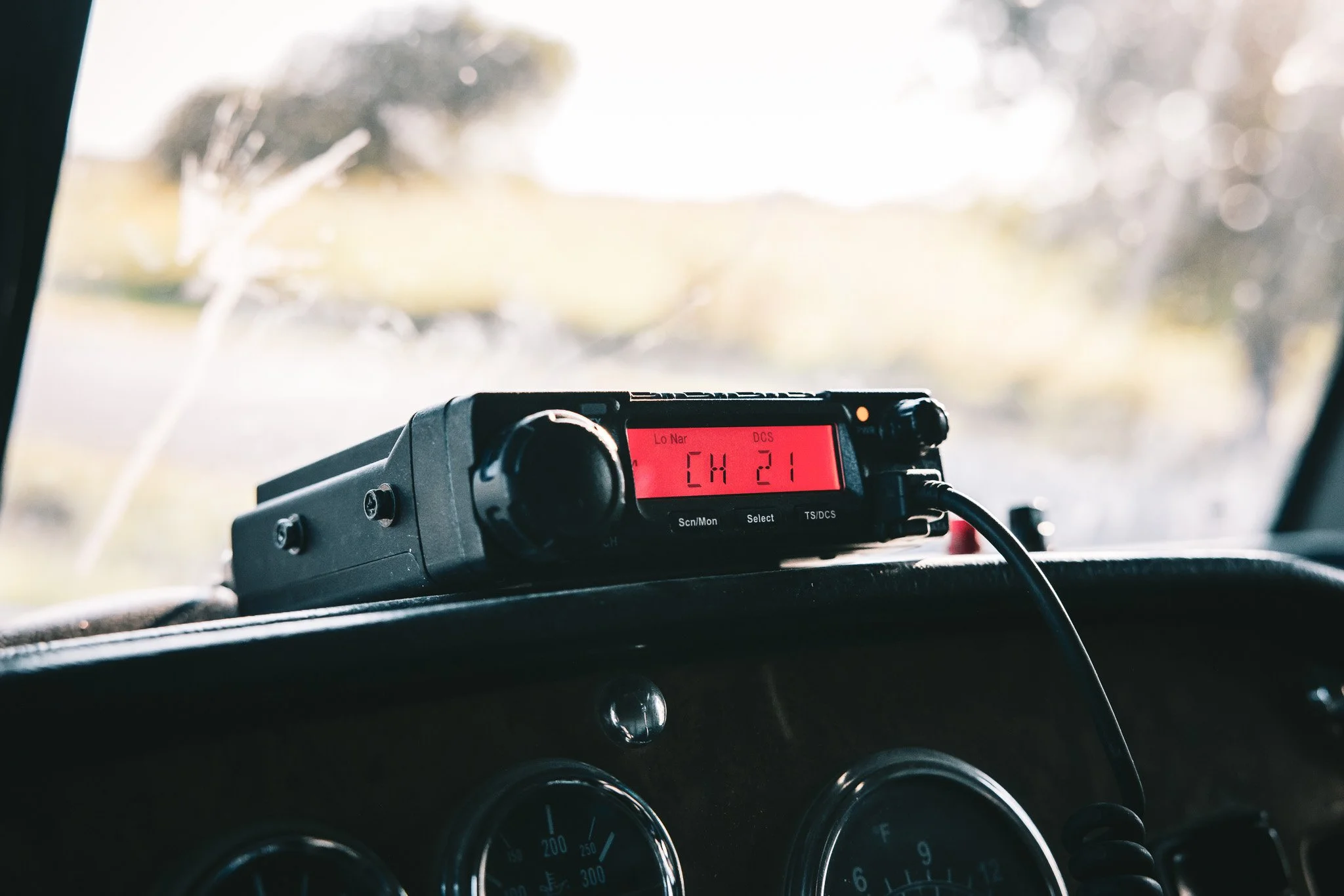 Aircraft radio communication device mounted on airplane dashboard.