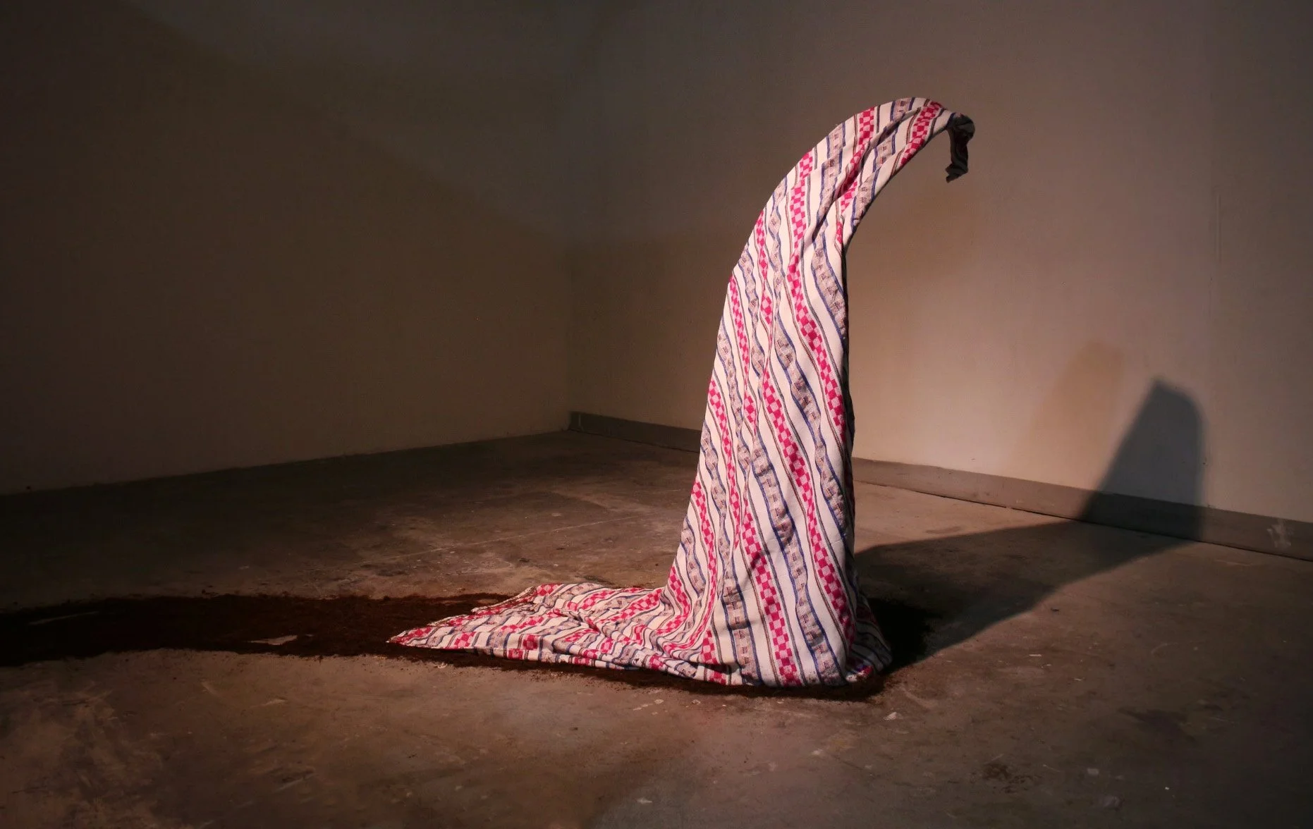 Childish Thoughts, 2023. Blanket, Steel Rods, Dirt, Fabric Hardener. 42" x 60" x 72".