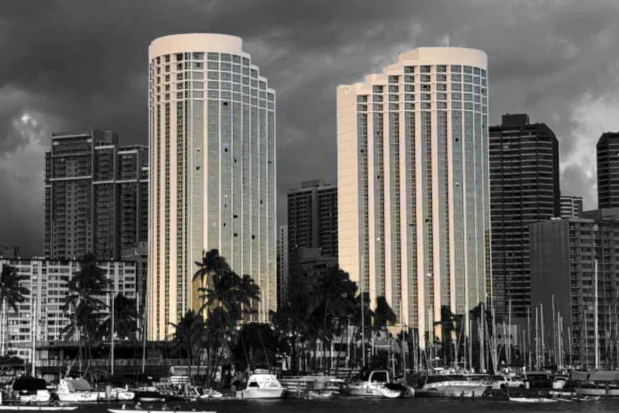 Black and white image with spots of color of the haunted Prince Waikiki hotel