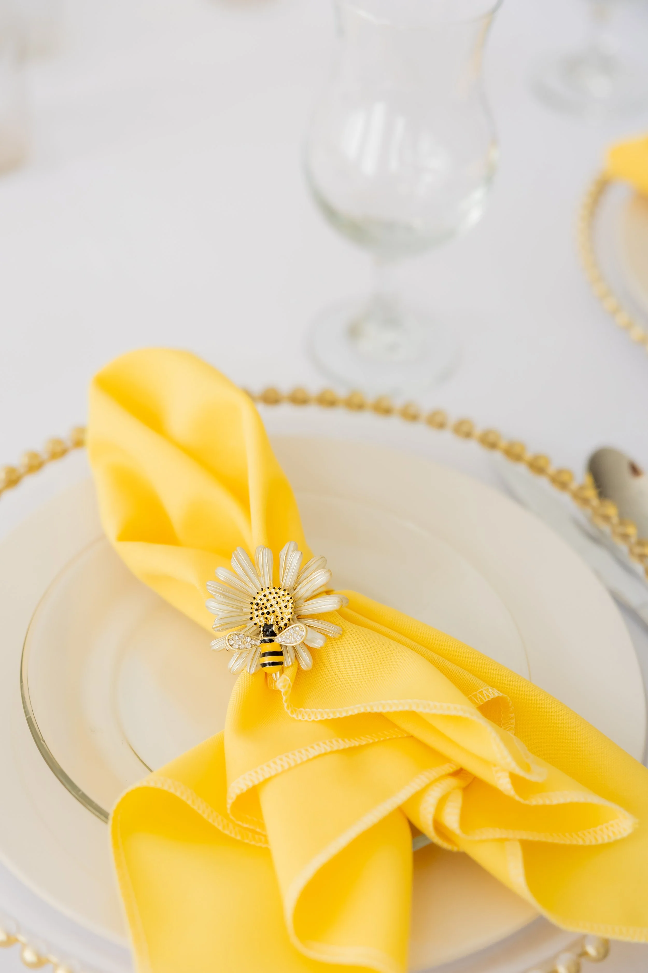 Pictured with Full Place Settings Add On (Yellow Napkins + Beaded Charger Upgrade)