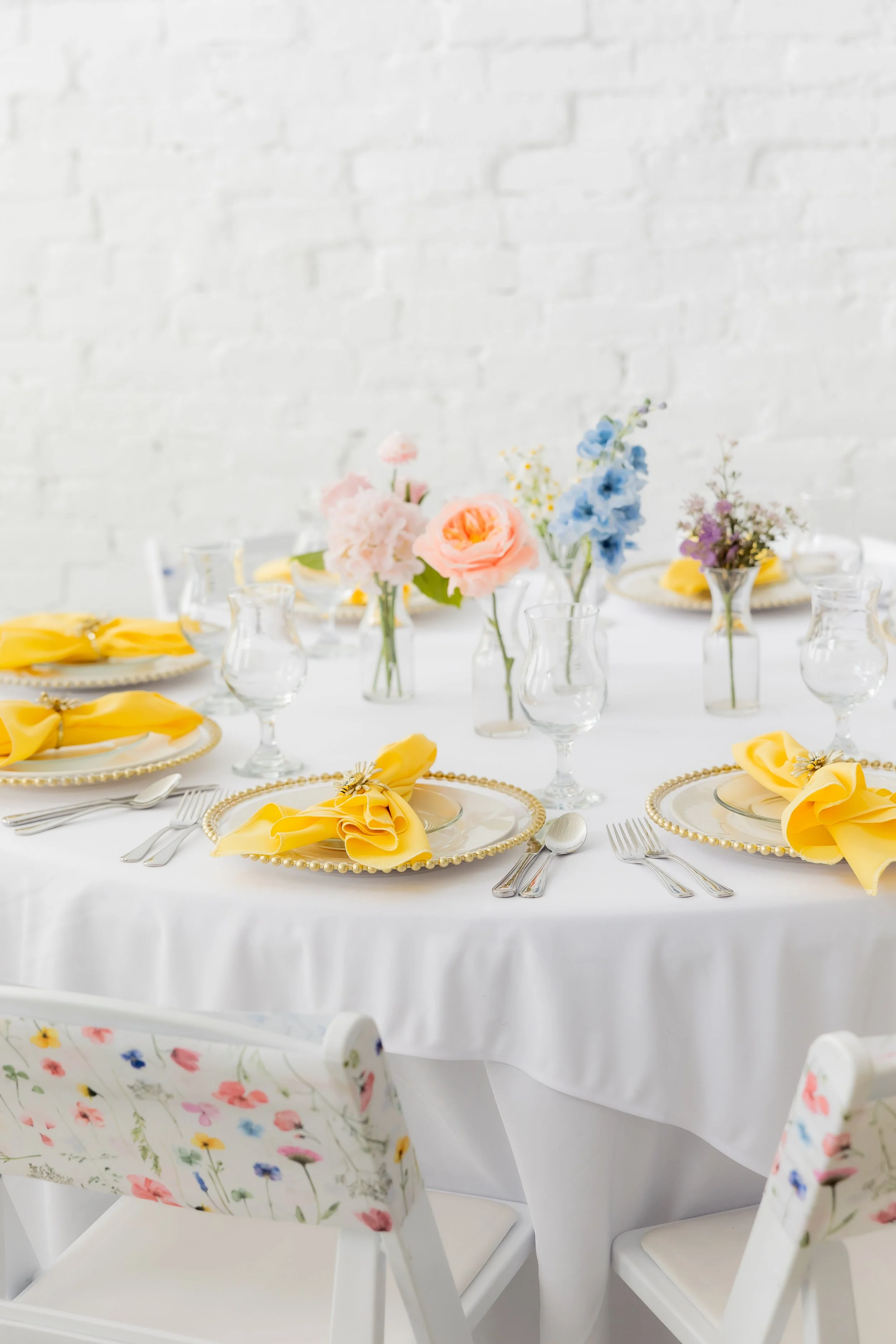 Pictured with Full Place Settings Add On (Yellow Napkins + Beaded Charger Upgrade)