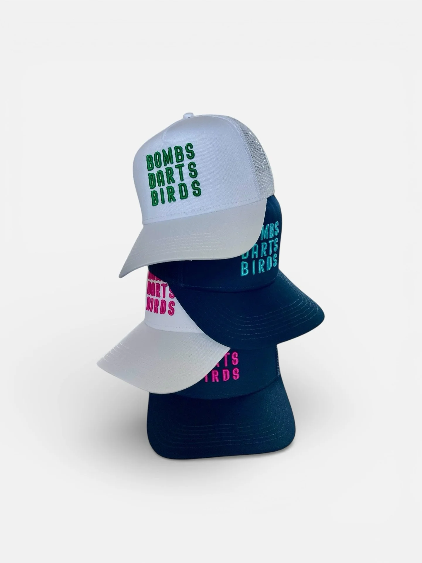 OG Bombs Darts Birds Truckers. Where it all started. Our best seller. 

Bomb off the tee 
Dart onto the green
Bird for the win