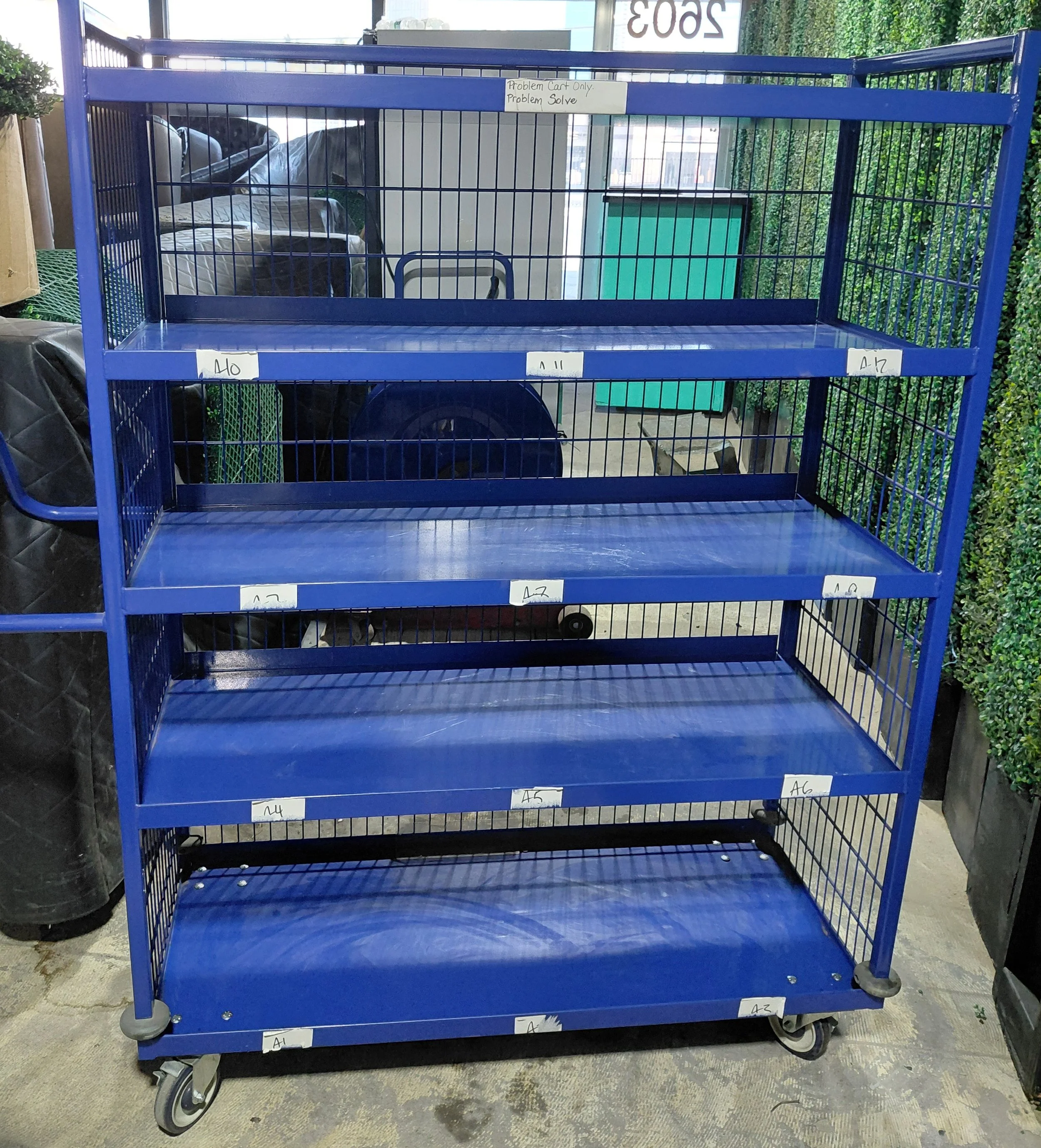Heavy-Duty 5-Shelf Rolling Storage Cart. 48" wide x 20" deep x 66" tall.
