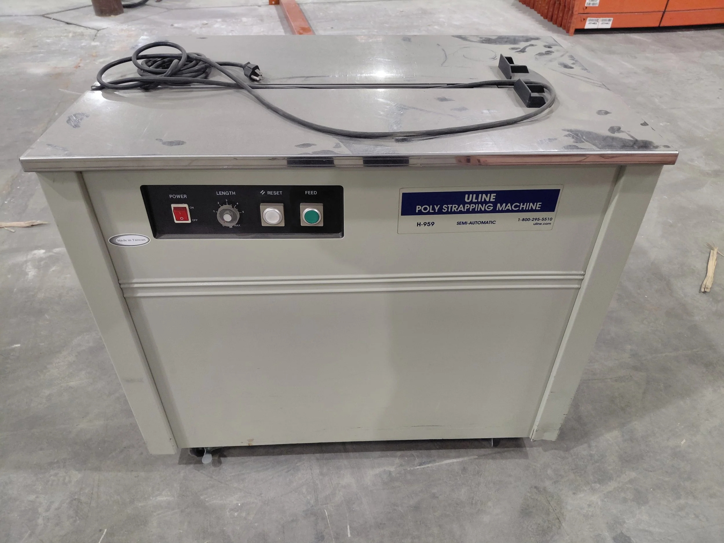 Uline Polypropylene Strapping Machine.