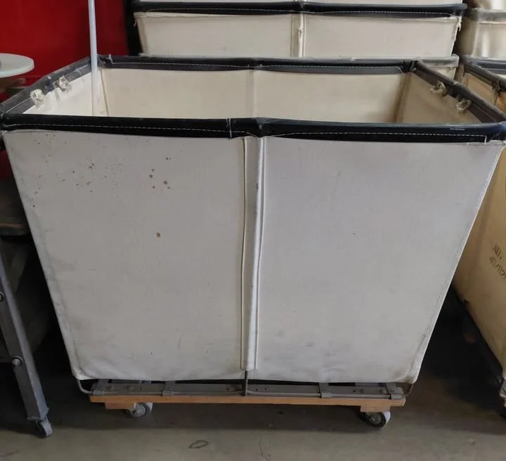 Canvas Basket Trucks on wheels. 27" x 38" x 34" tall.
