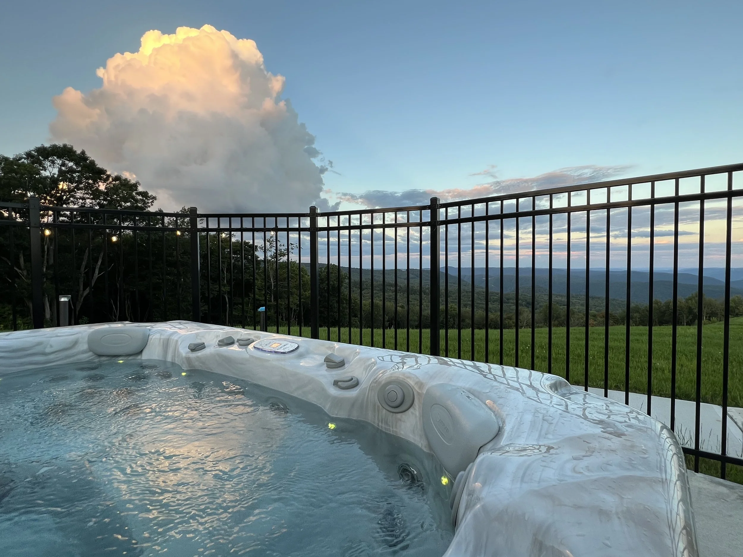 Hot tub with clouds.jpg