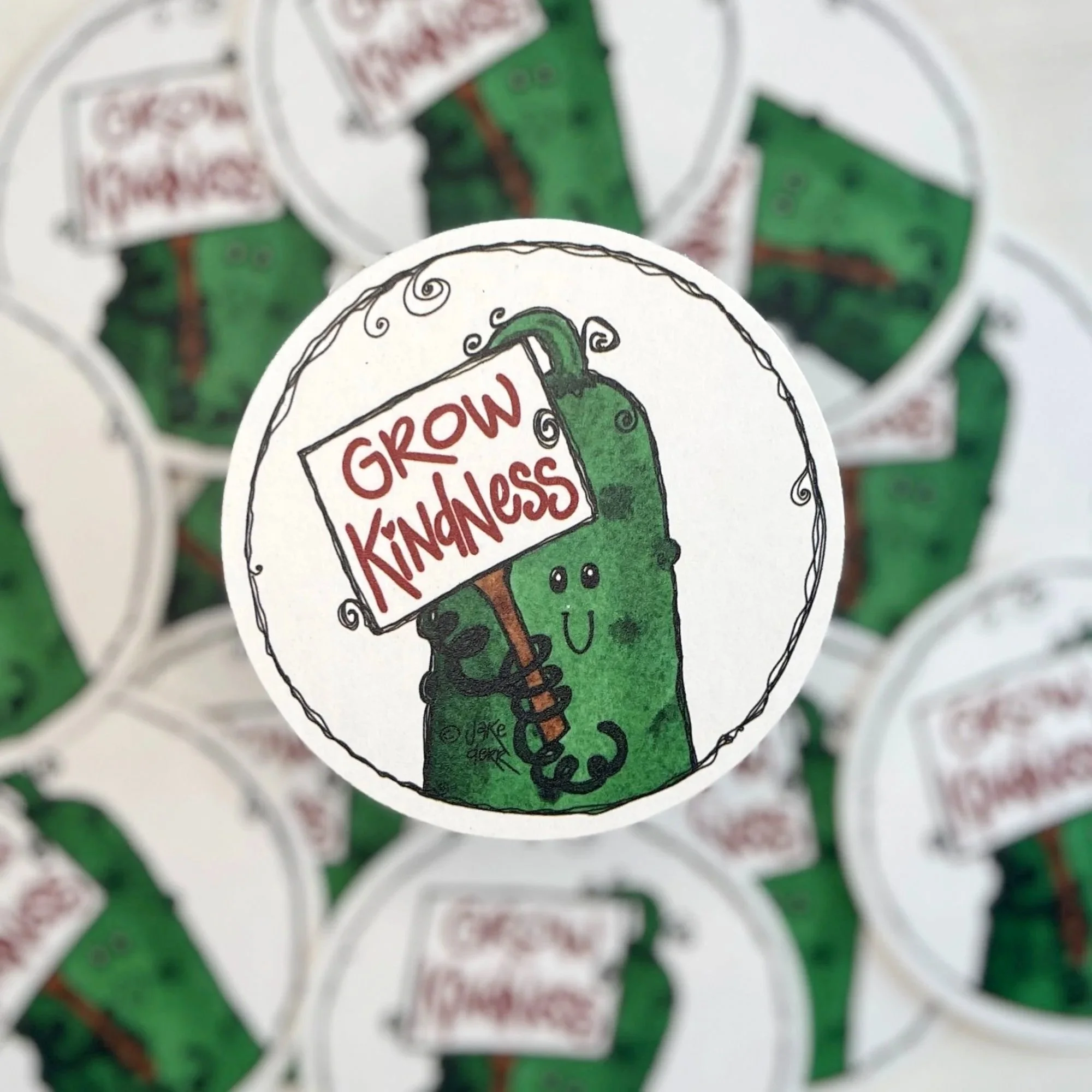 grow-kindness-cucumber-coaster-closeup-doodle-border.jpg