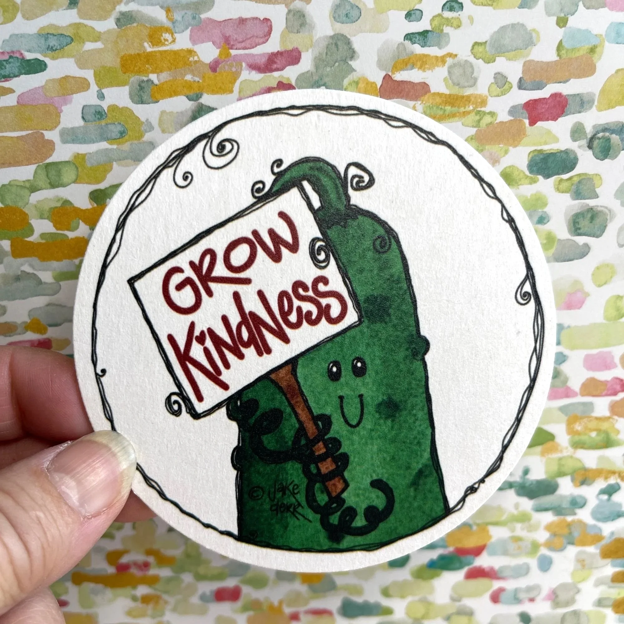 cultivating-kindness-crew-coaster-size-in-hand.jpg
