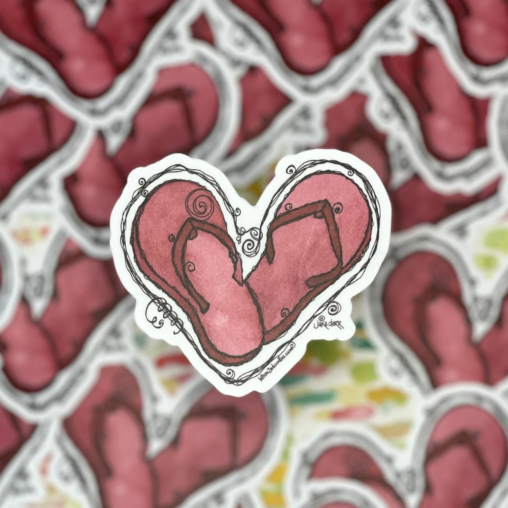 Close-up of “Flip-Flop Love” heart against softly blurred background of matching stickers